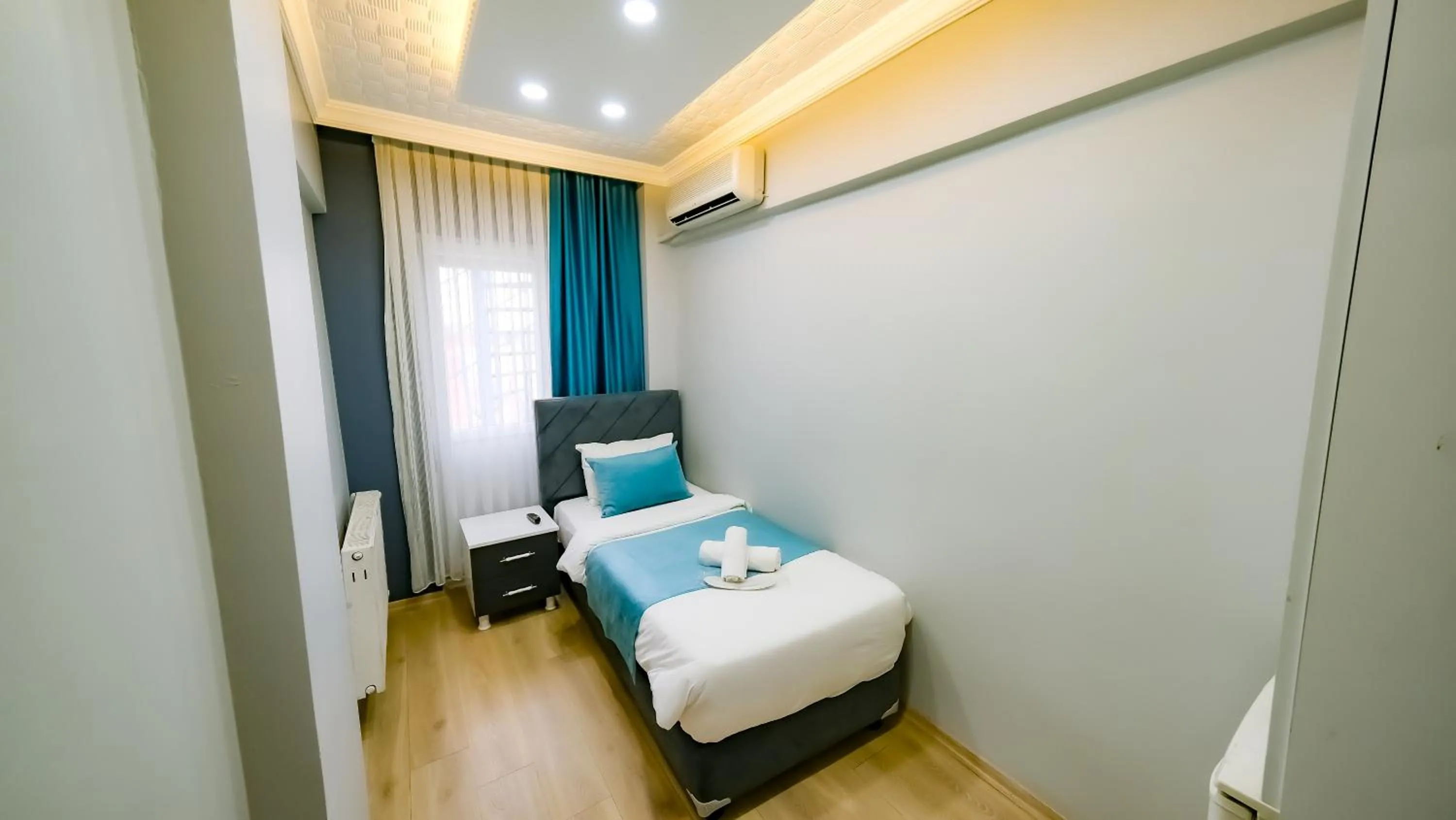 Bed in Bona Sera Hotel