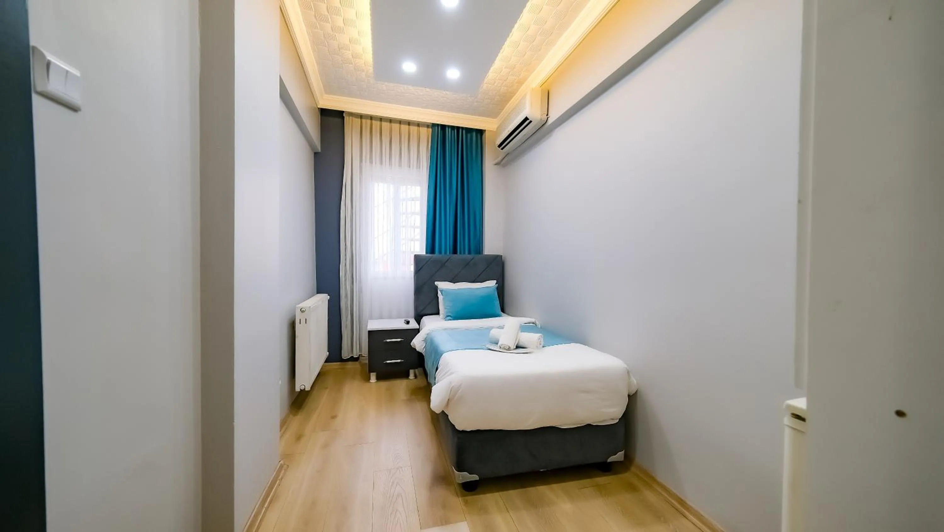 Bed in Bona Sera Hotel