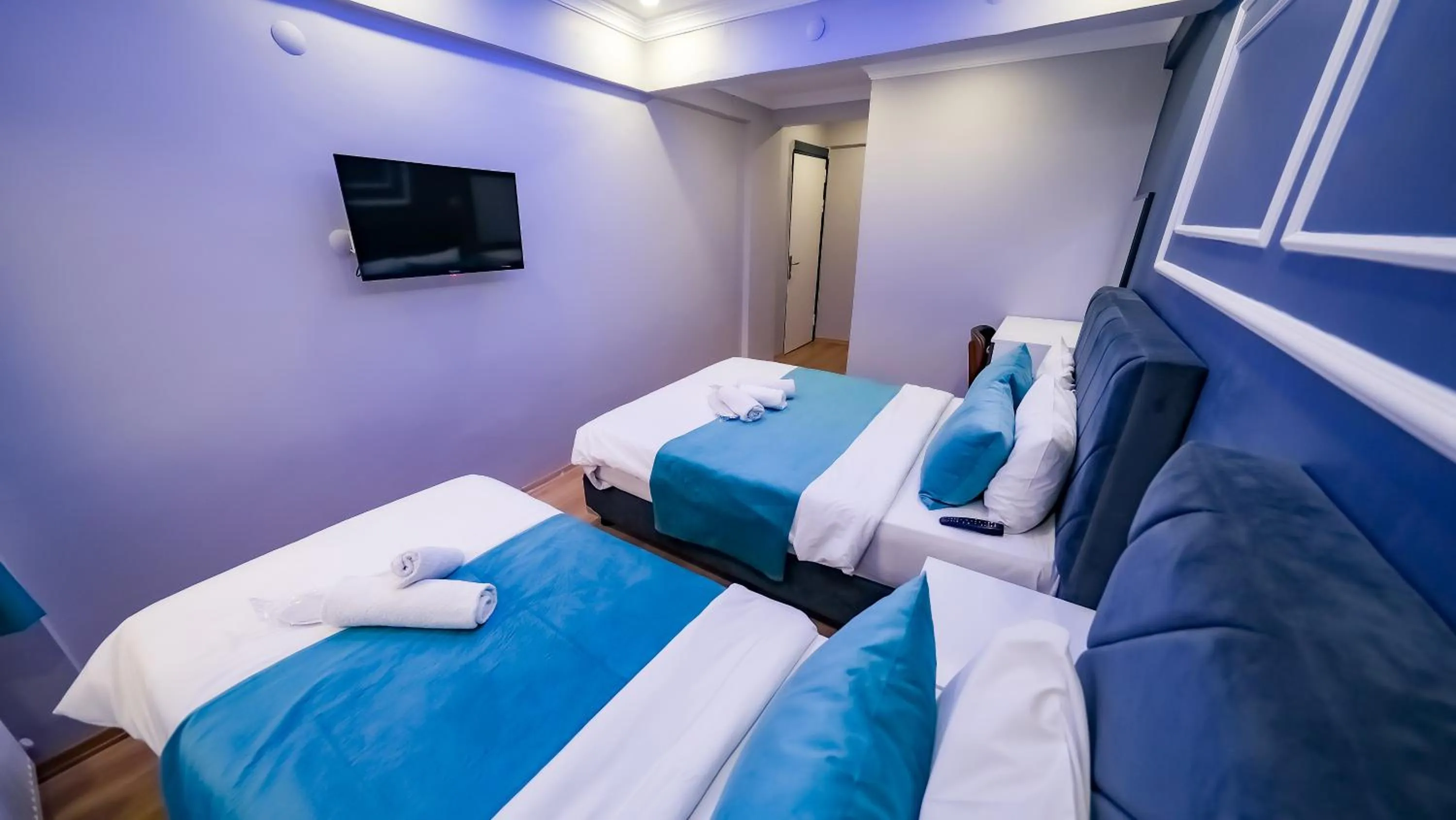 Bed in Bona Sera Hotel