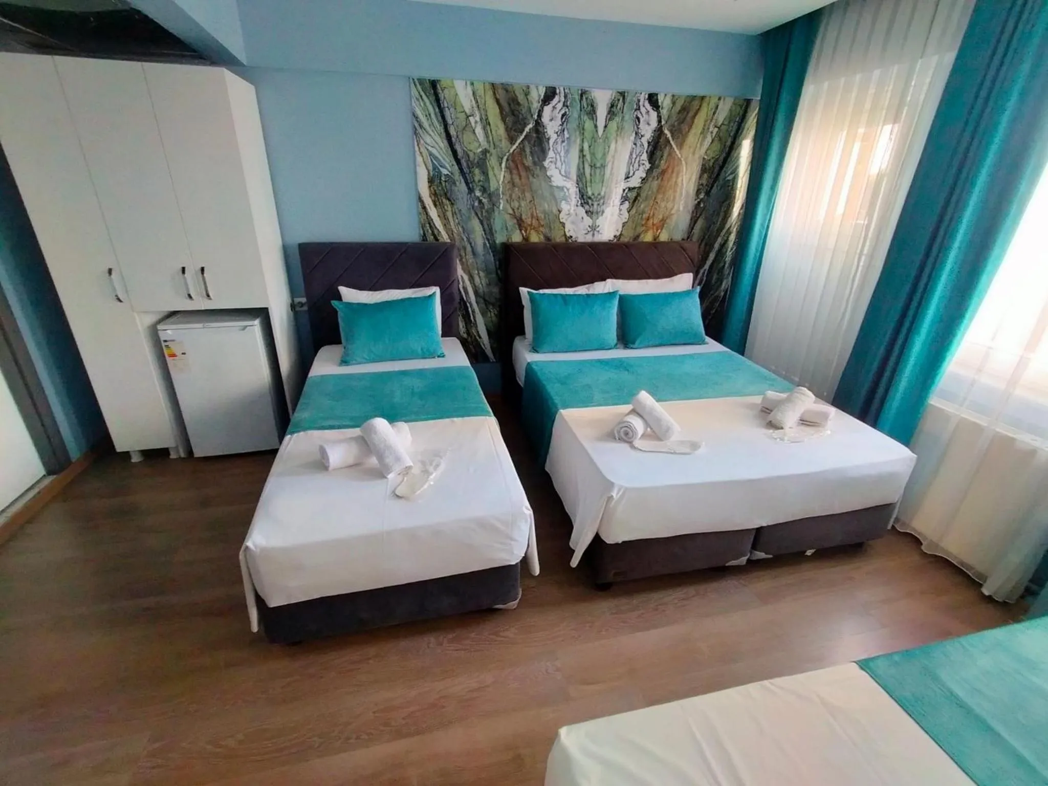Bed in Bona Sera Hotel