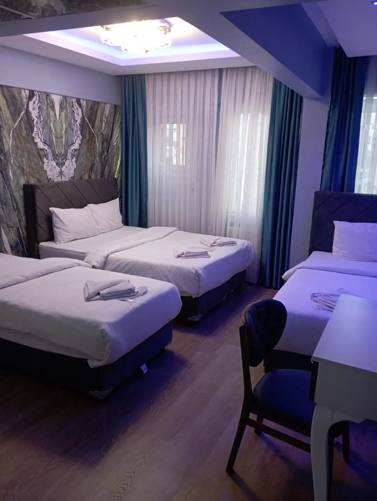 Bed in Bona Sera Hotel