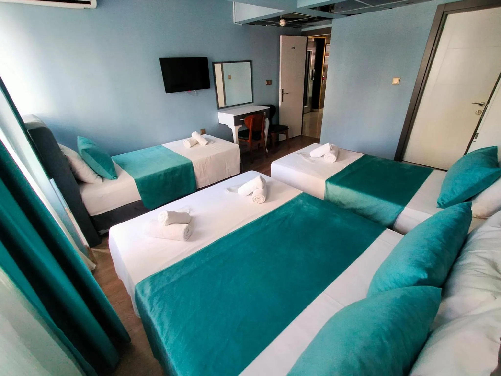 Bed in Bona Sera Hotel