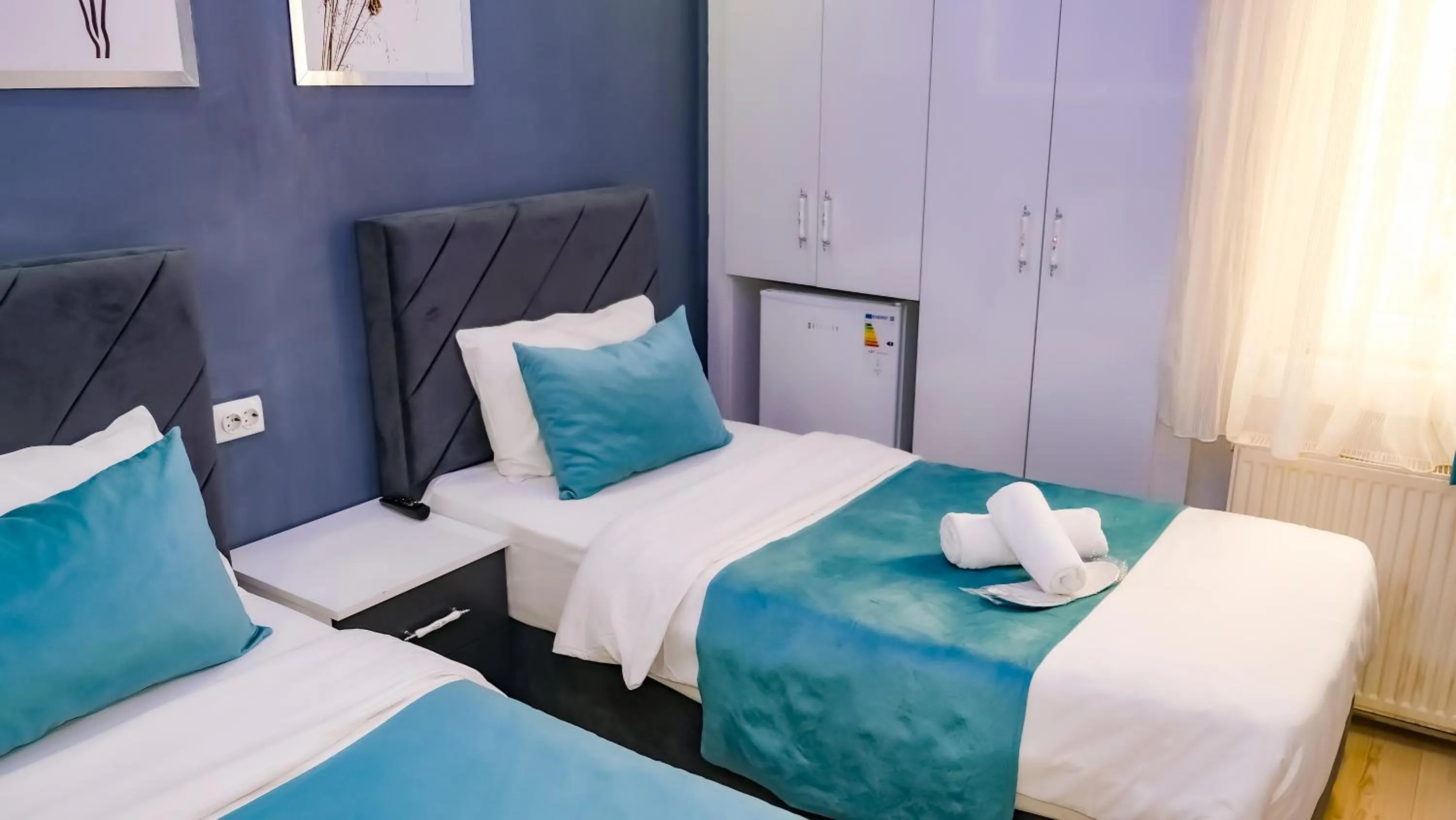 Bed in Bona Sera Hotel