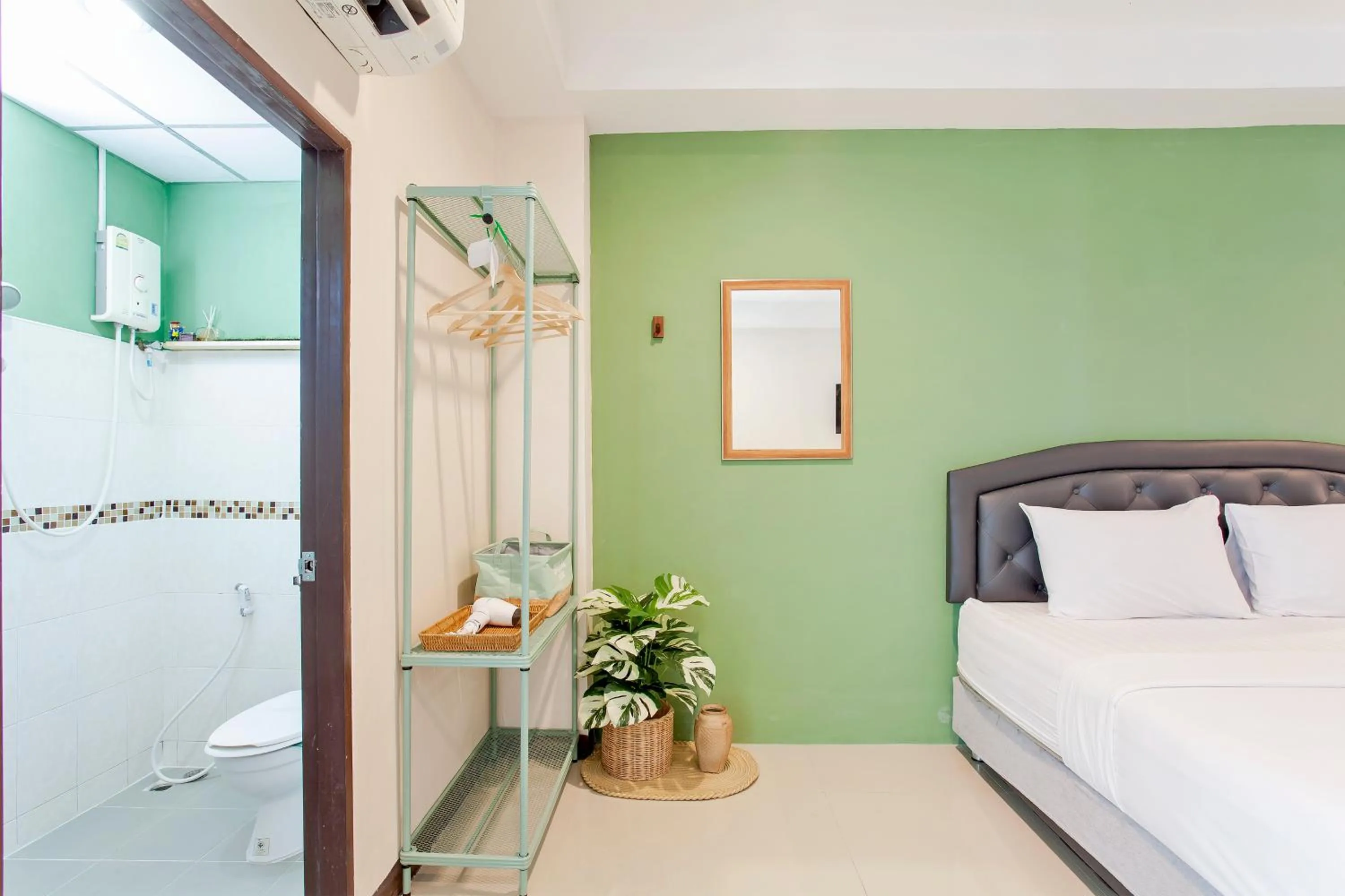Living room, Bed in Cozzi by Grand Airport Resort