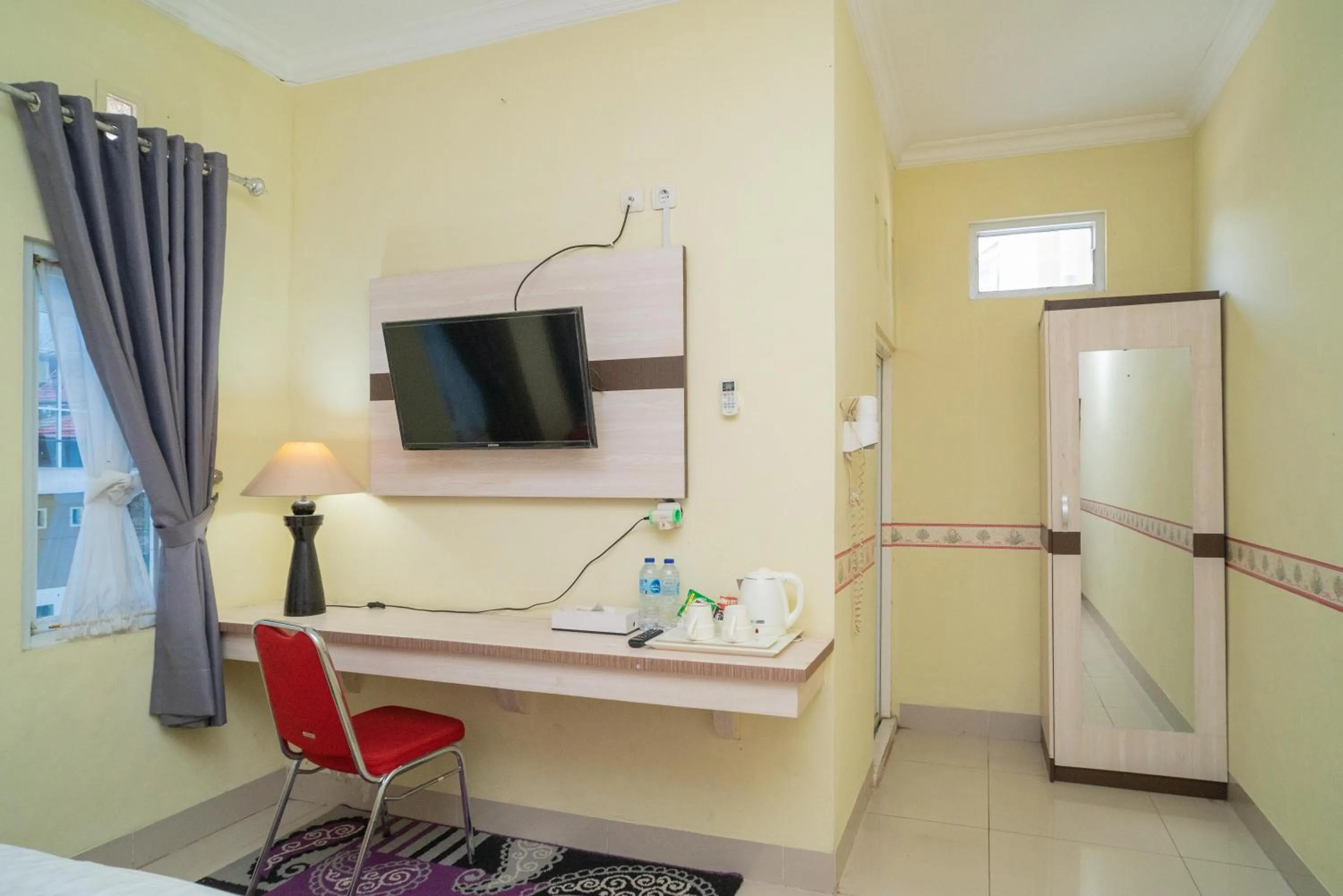 RedDoorz Syariah Near Lapangan Dwiwarna Barabai