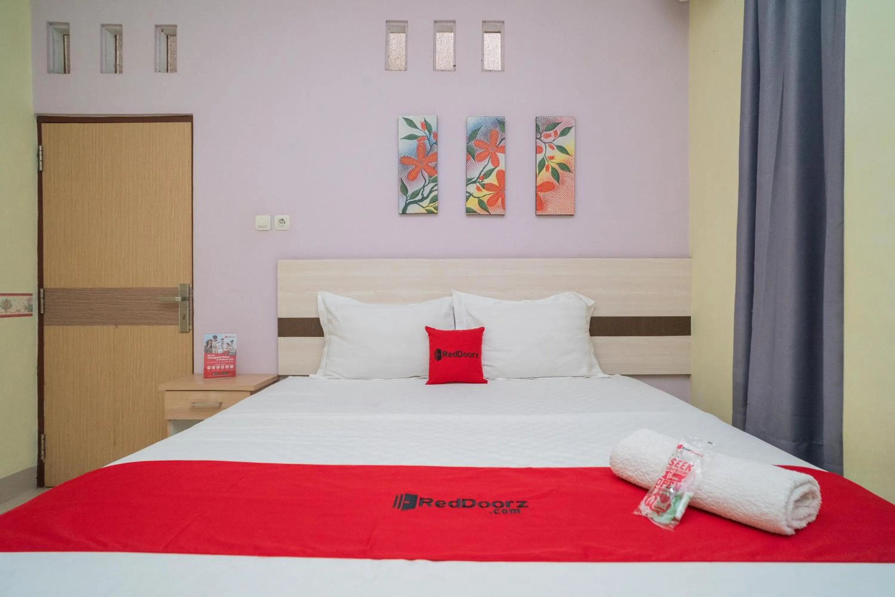 Bed in RedDoorz Syariah Near Lapangan Dwiwarna Barabai