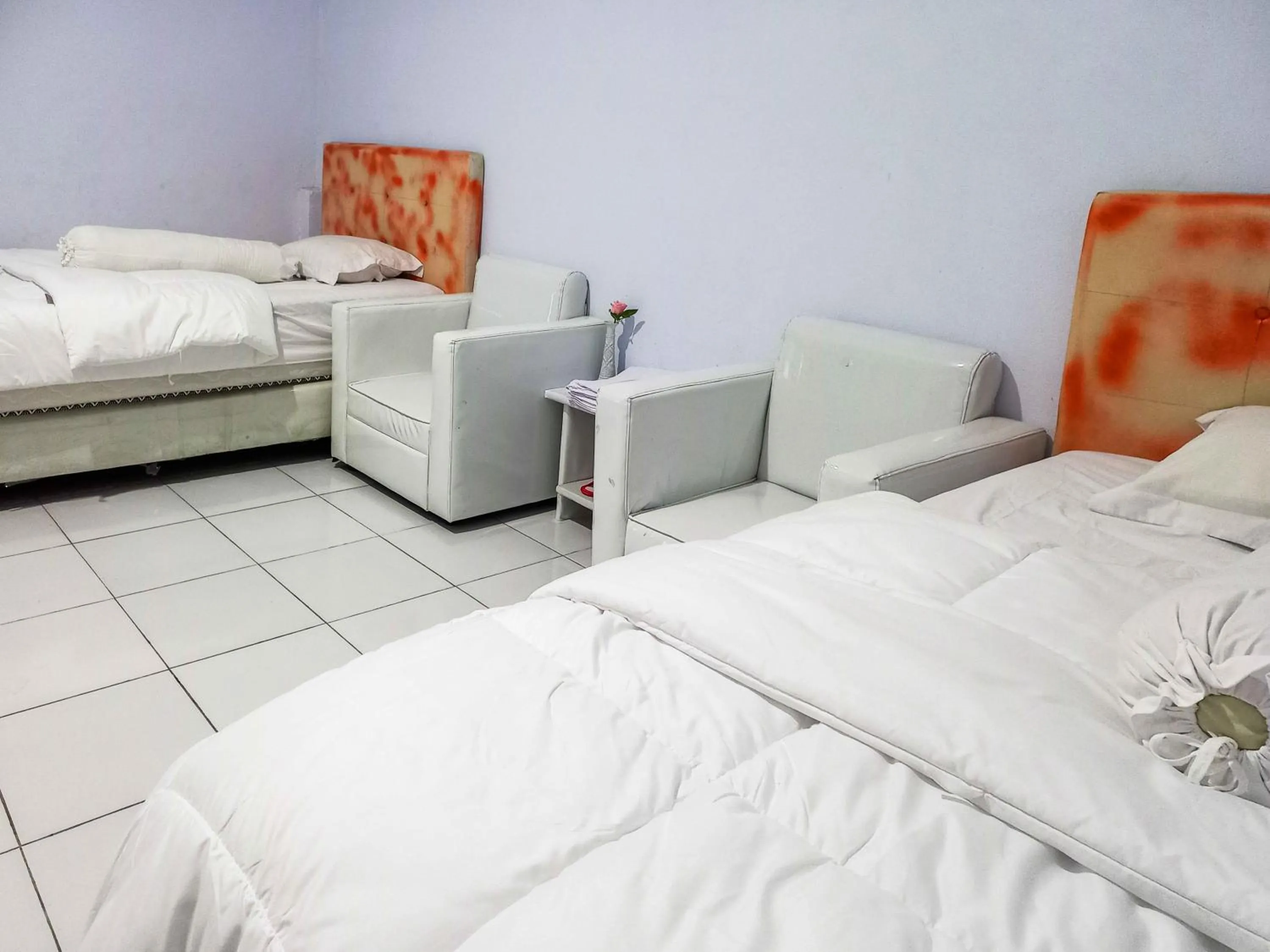 Bed in RedDoorz @ Lolak Bolaang Mongondow