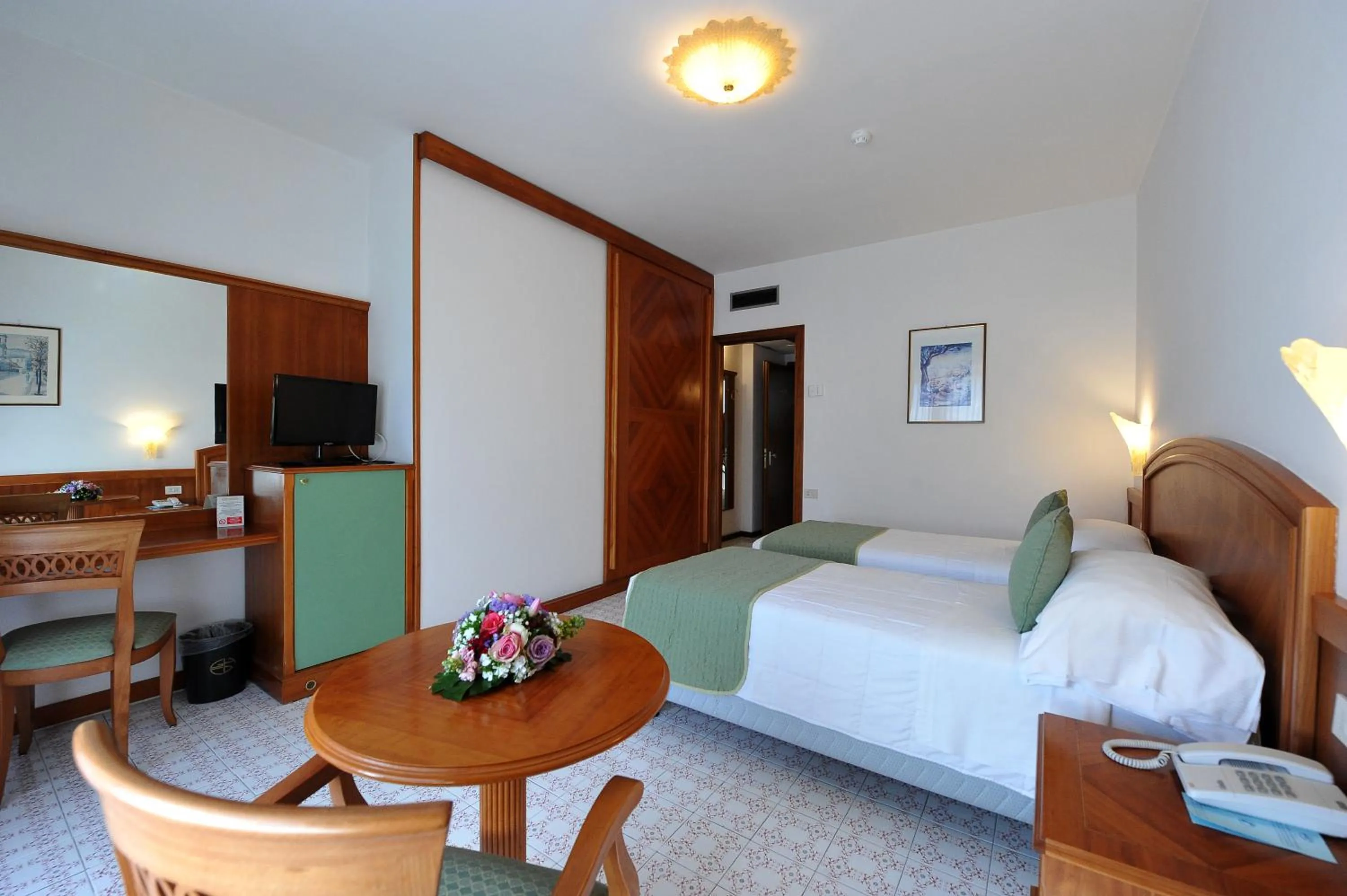 Photo of the whole room, Bed in Grand Hotel Cesare Augusto