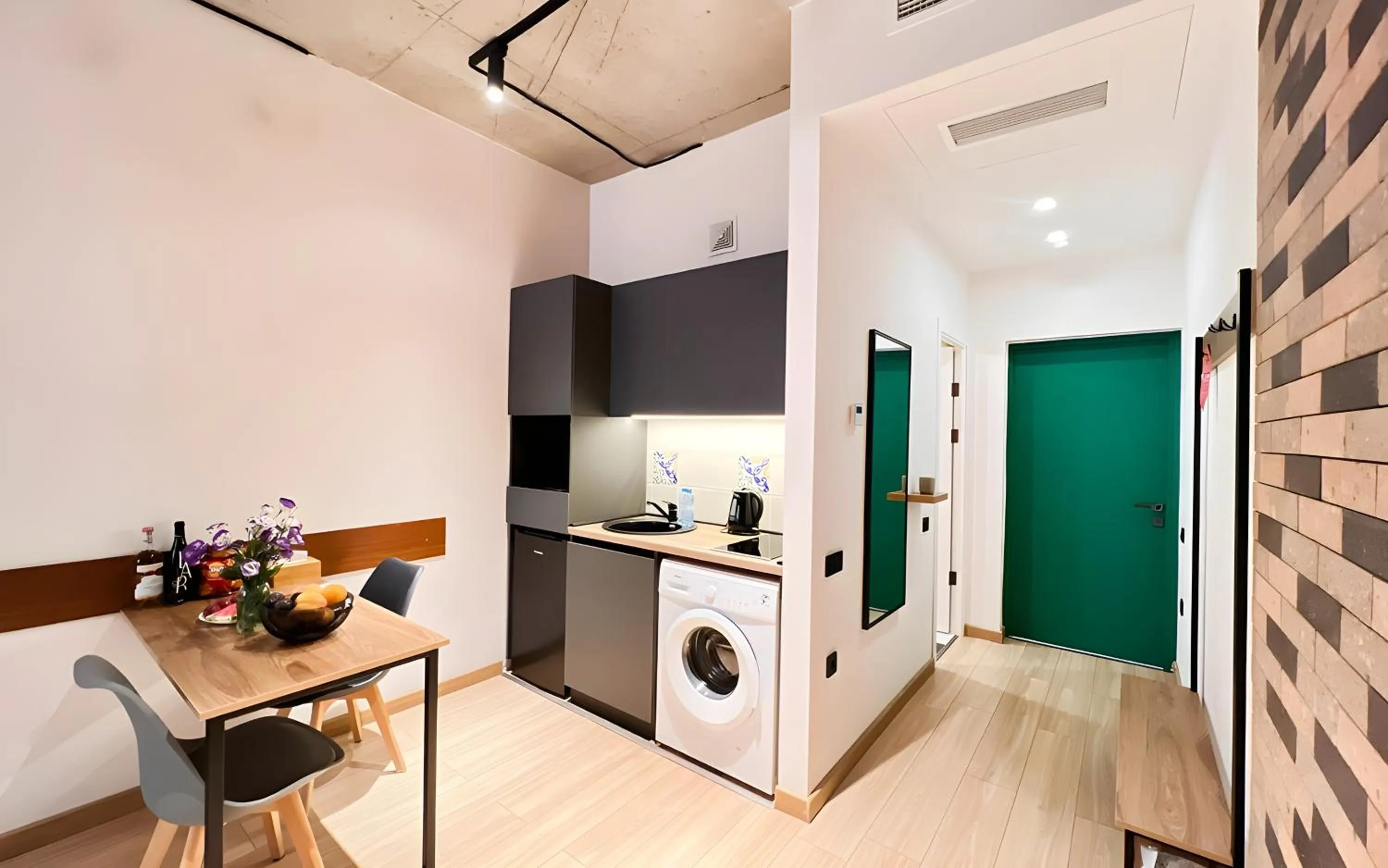 Kitchen or kitchenette in Rooms Apart Hotel by RED