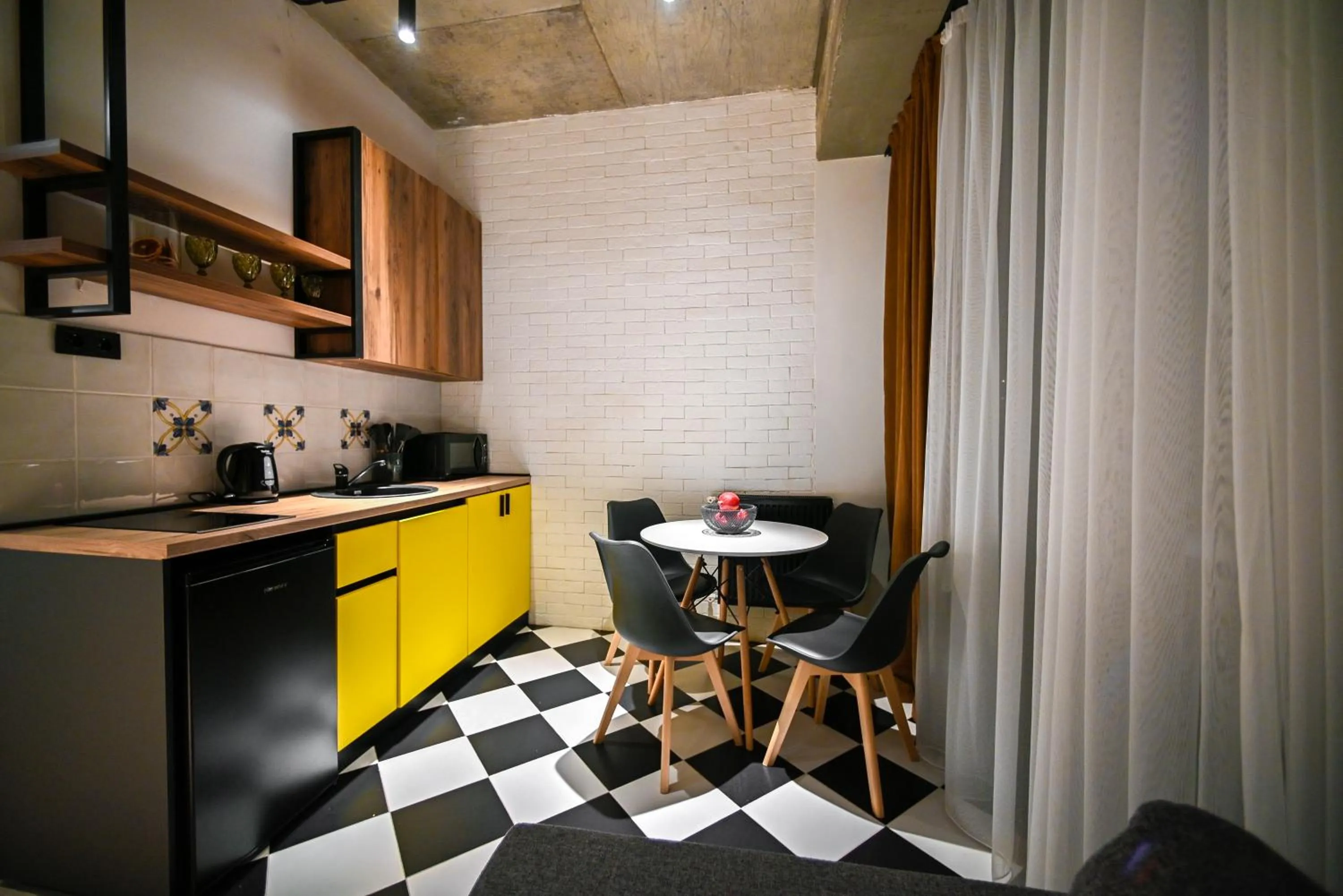 Kitchen or kitchenette in Rooms Apart Hotel by RED