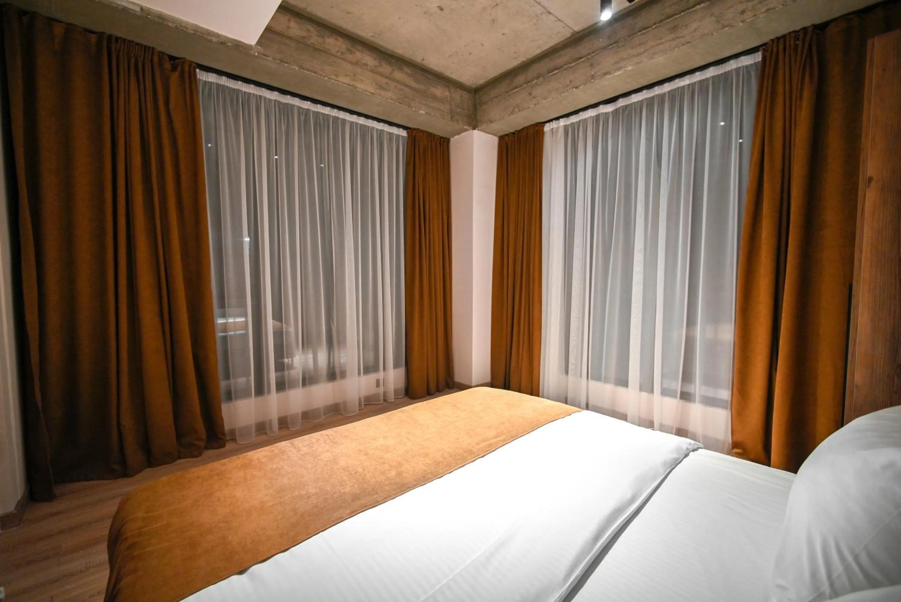 Bed in Rooms Apart Hotel by RED