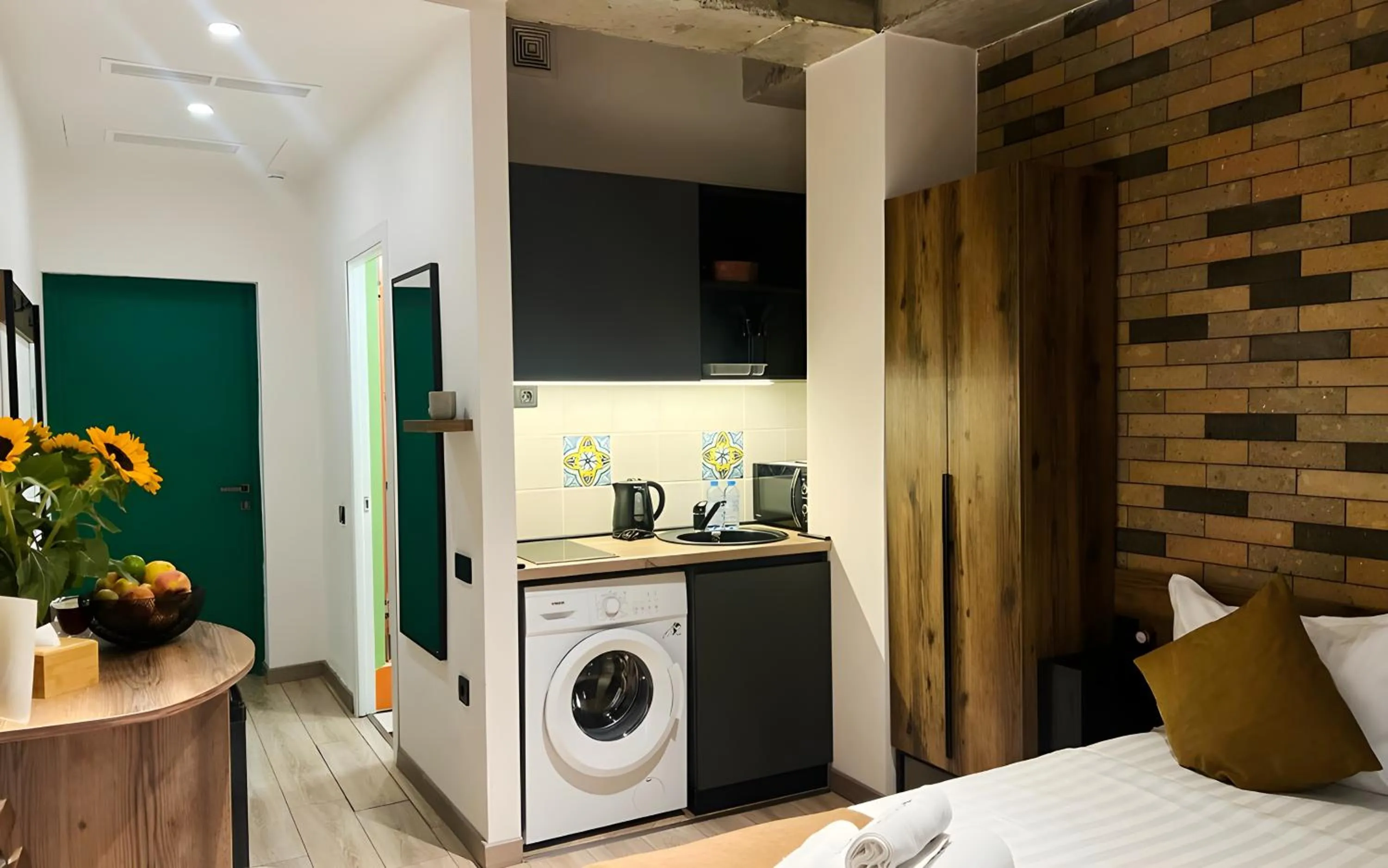 Kitchen or kitchenette, Bed in Rooms Apart Hotel by RED