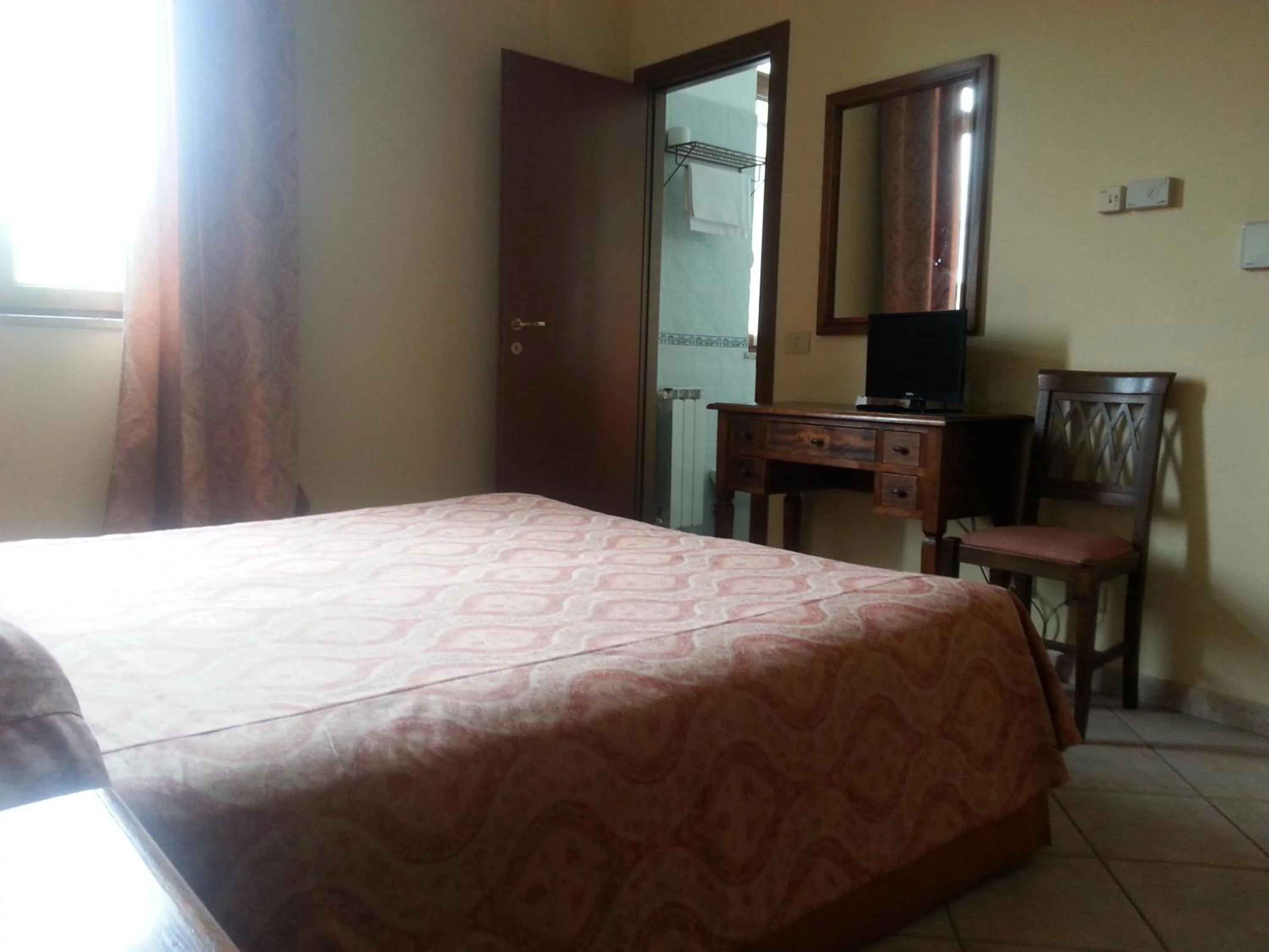 Photo of the whole room, Bed in Hotel Tempio di Apollo
