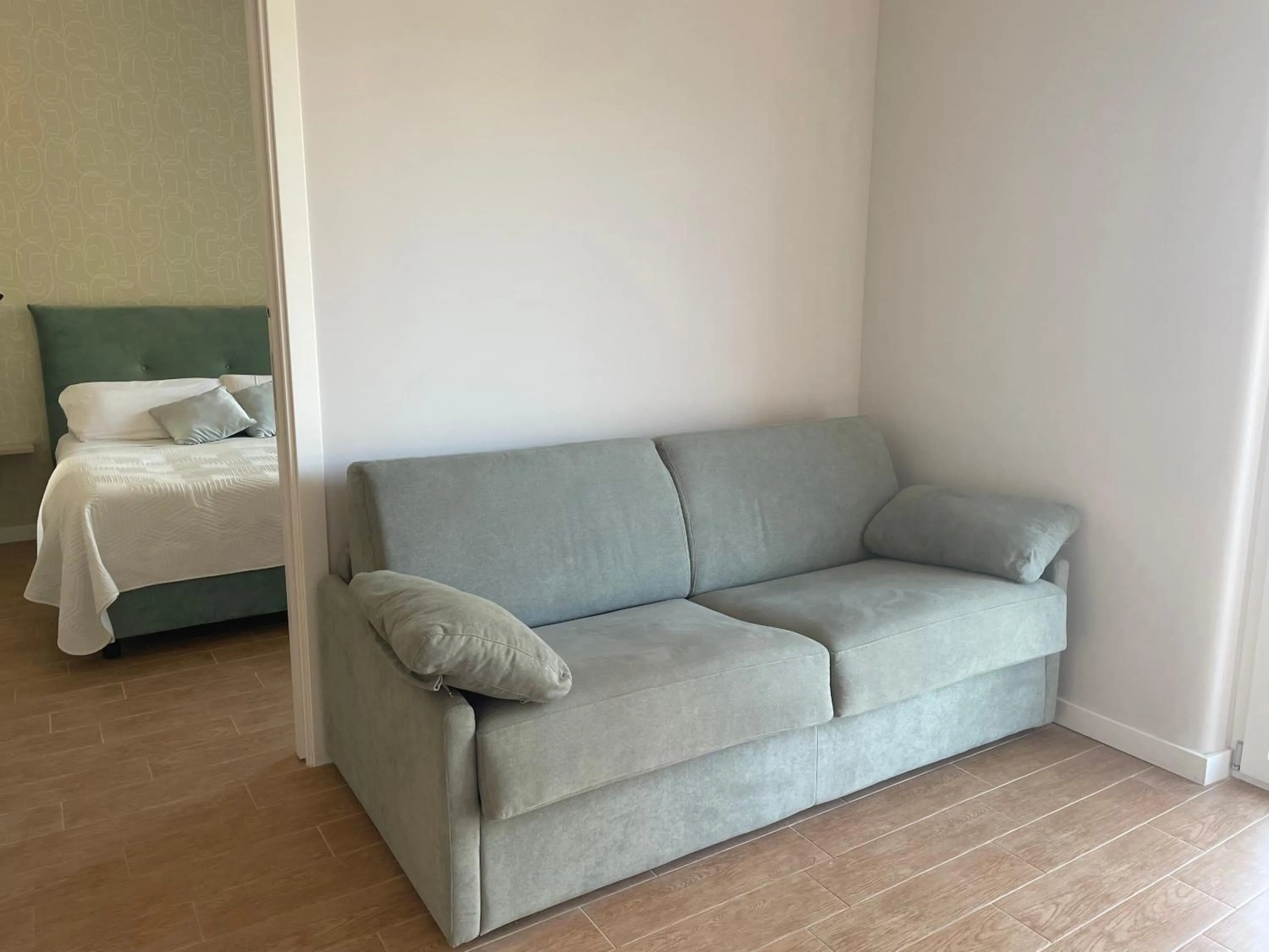 Living room, Bed in GiGa MaRe Apartments