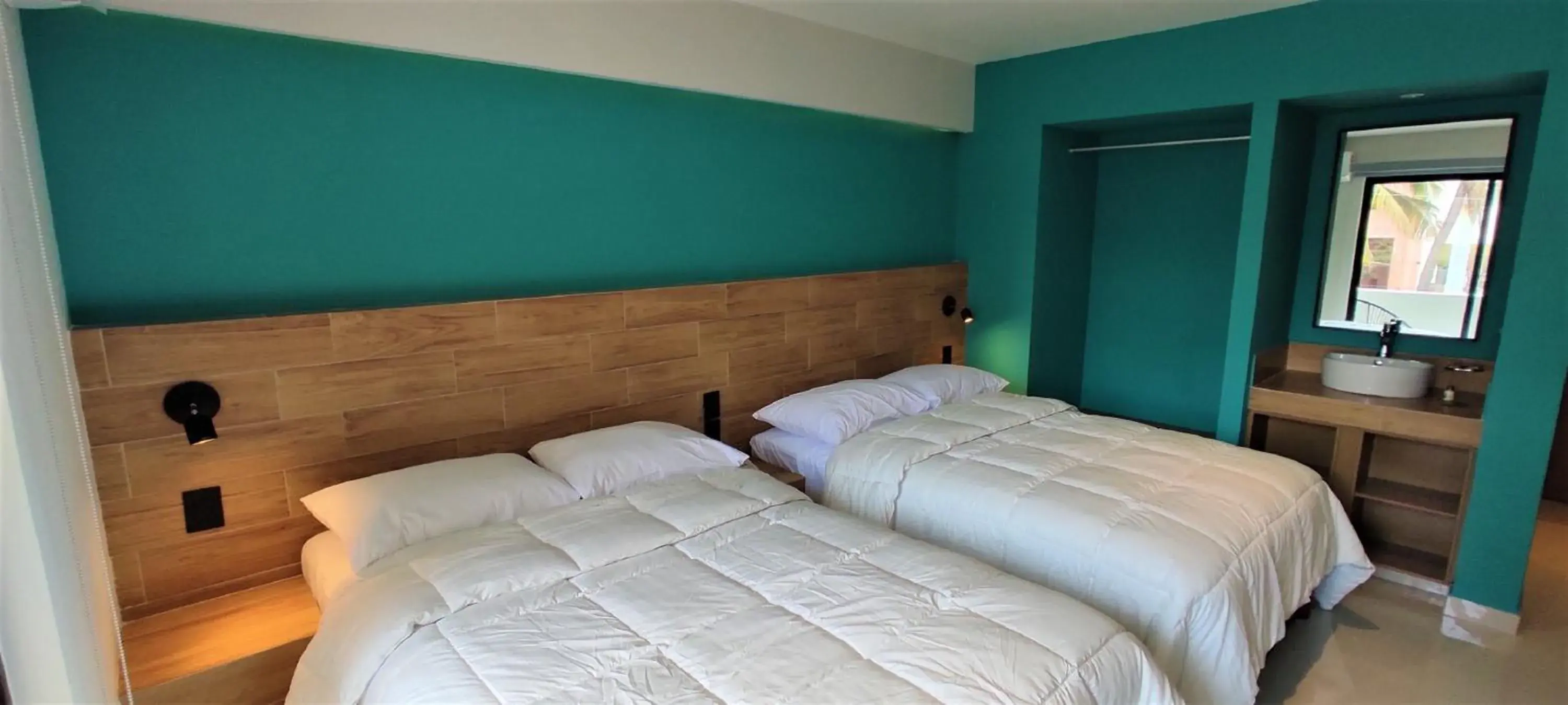 Bed in Hotel Kavia Mazatlán Bed in Hotel Kavia Mazatlán