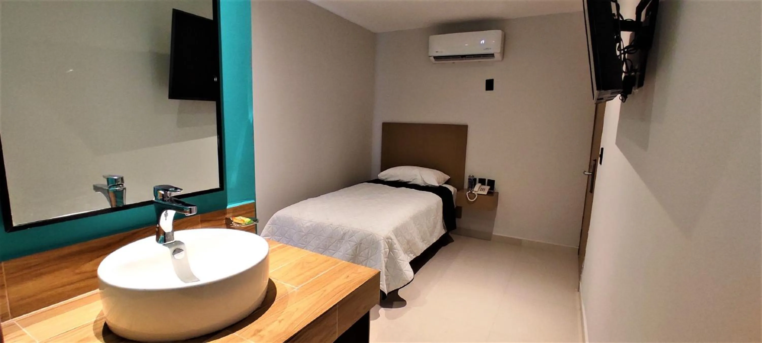 Bed in Hotel Kavia Mazatlán