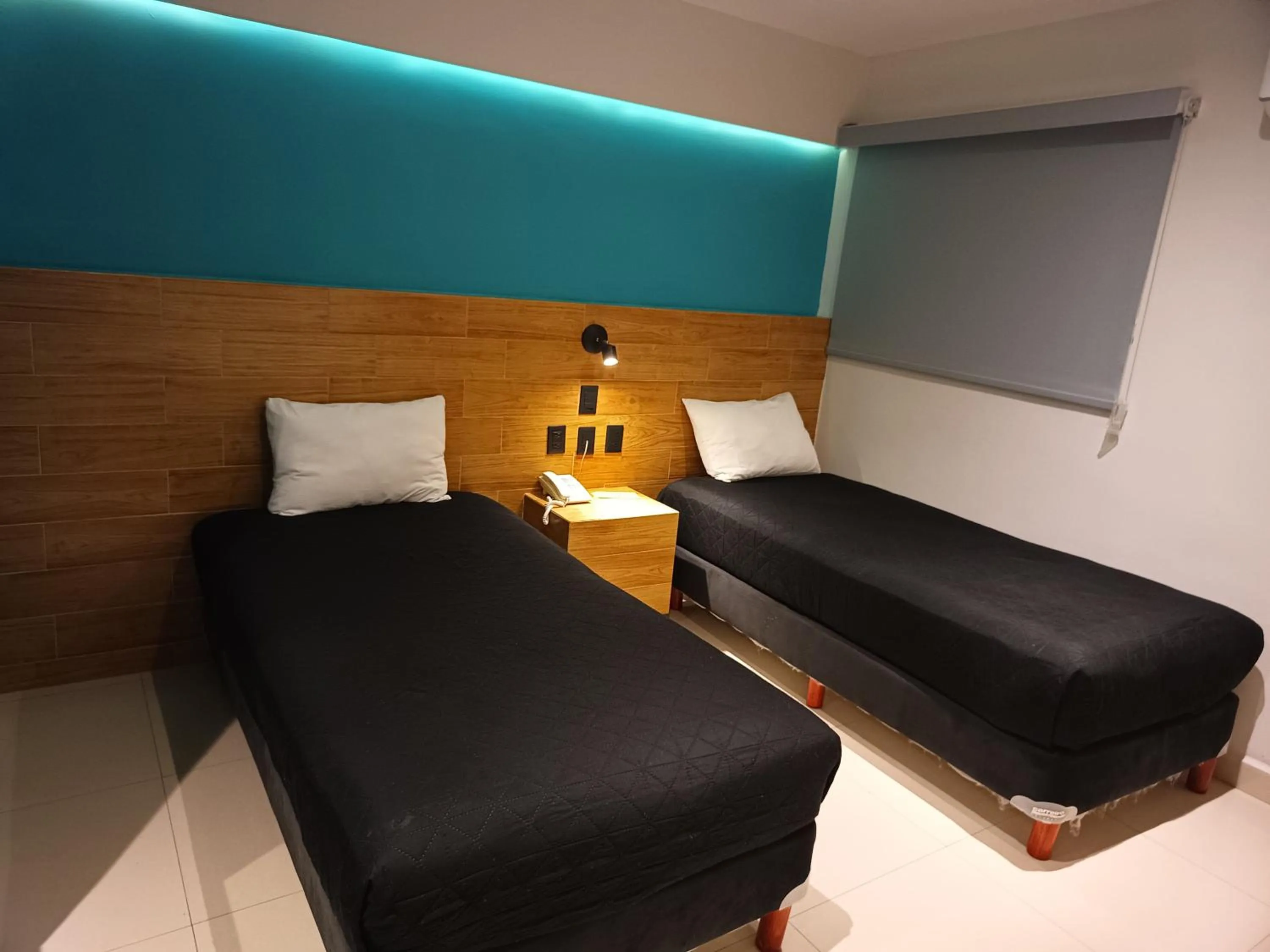 Bed in Hotel Kavia Mazatlán