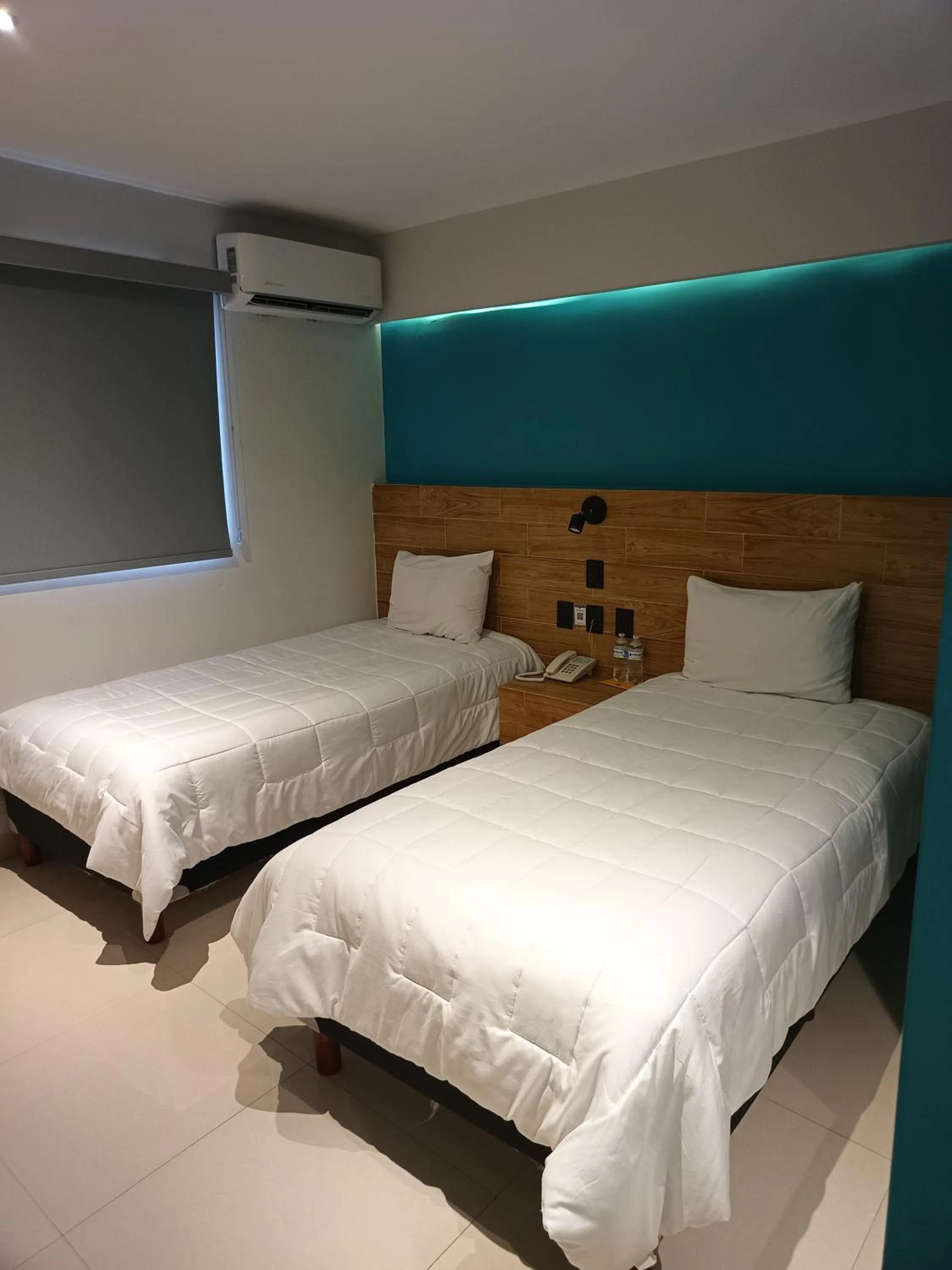 Bed in Hotel Kavia Mazatlán