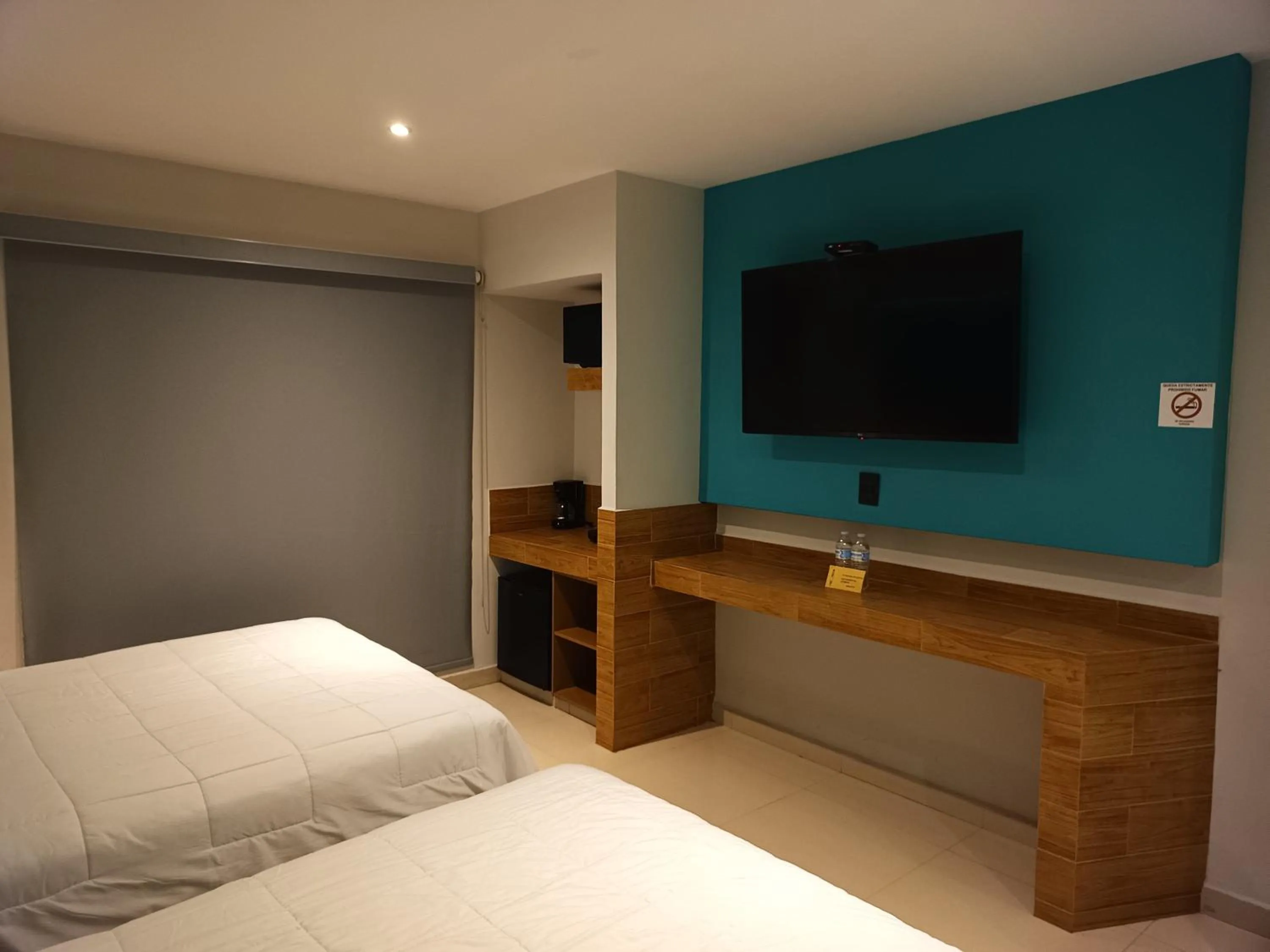 Bed in Hotel Kavia Mazatlán