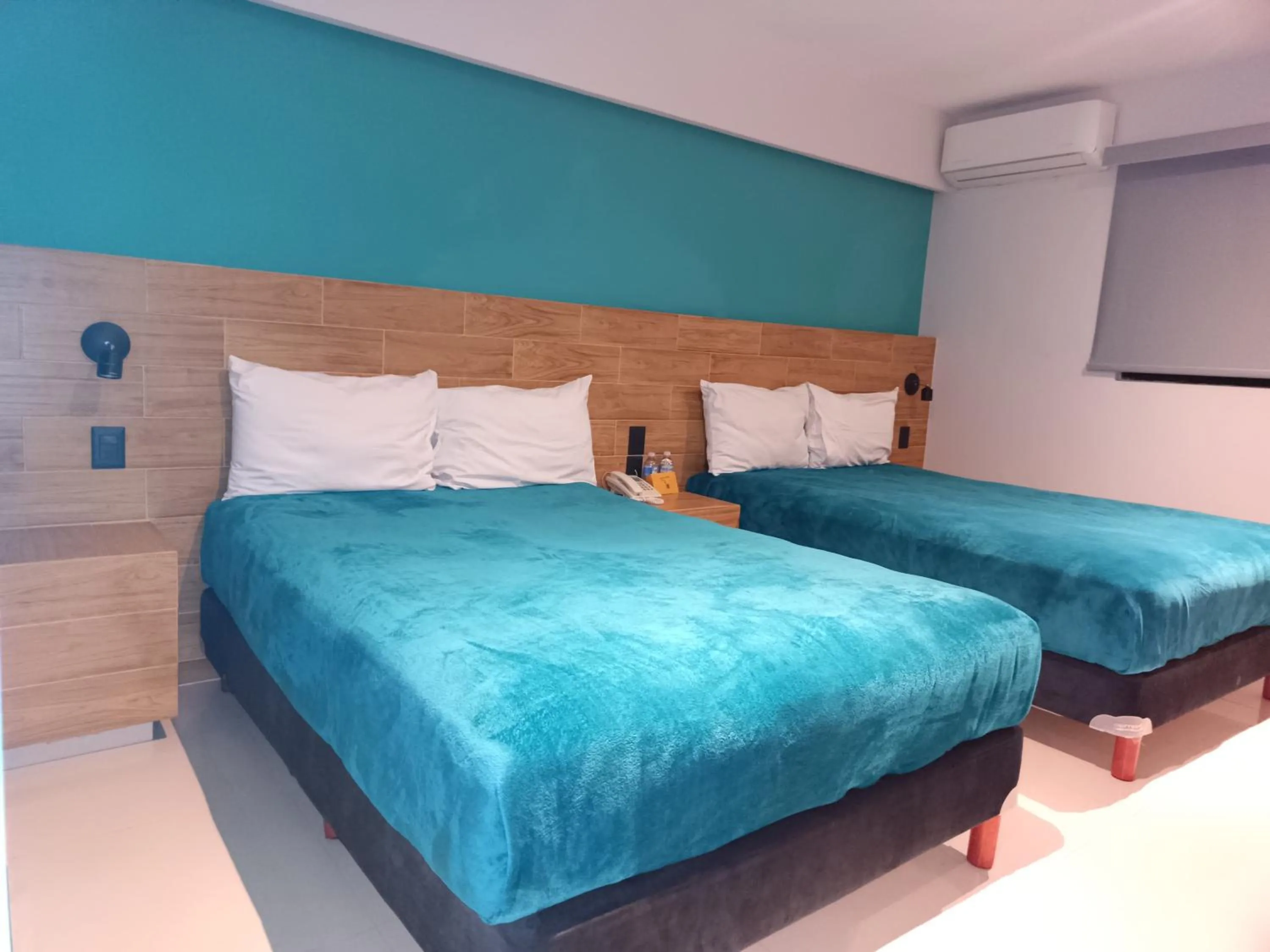 Bed in Hotel Kavia Mazatlán