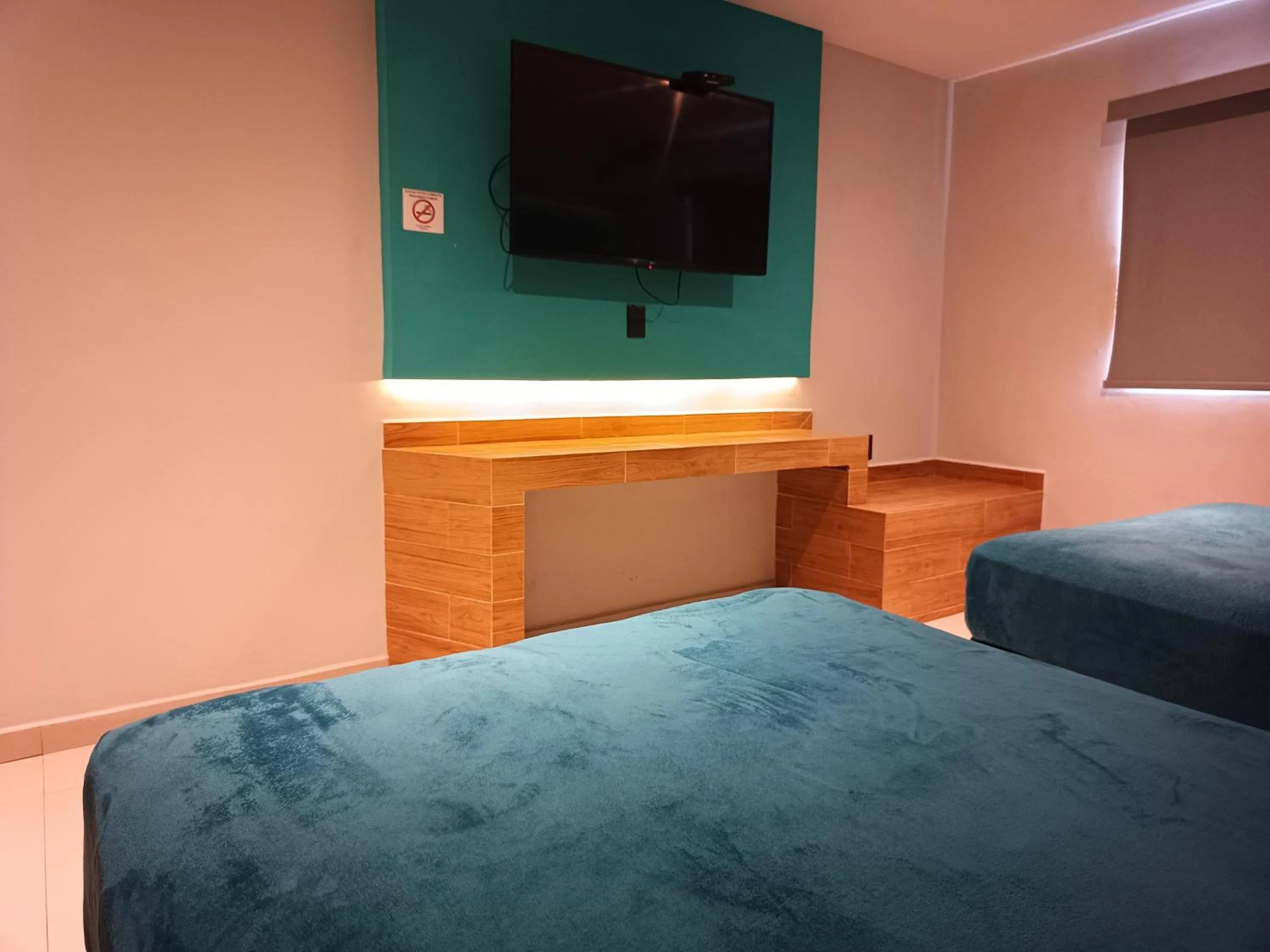 Bed in Hotel Kavia Mazatlán