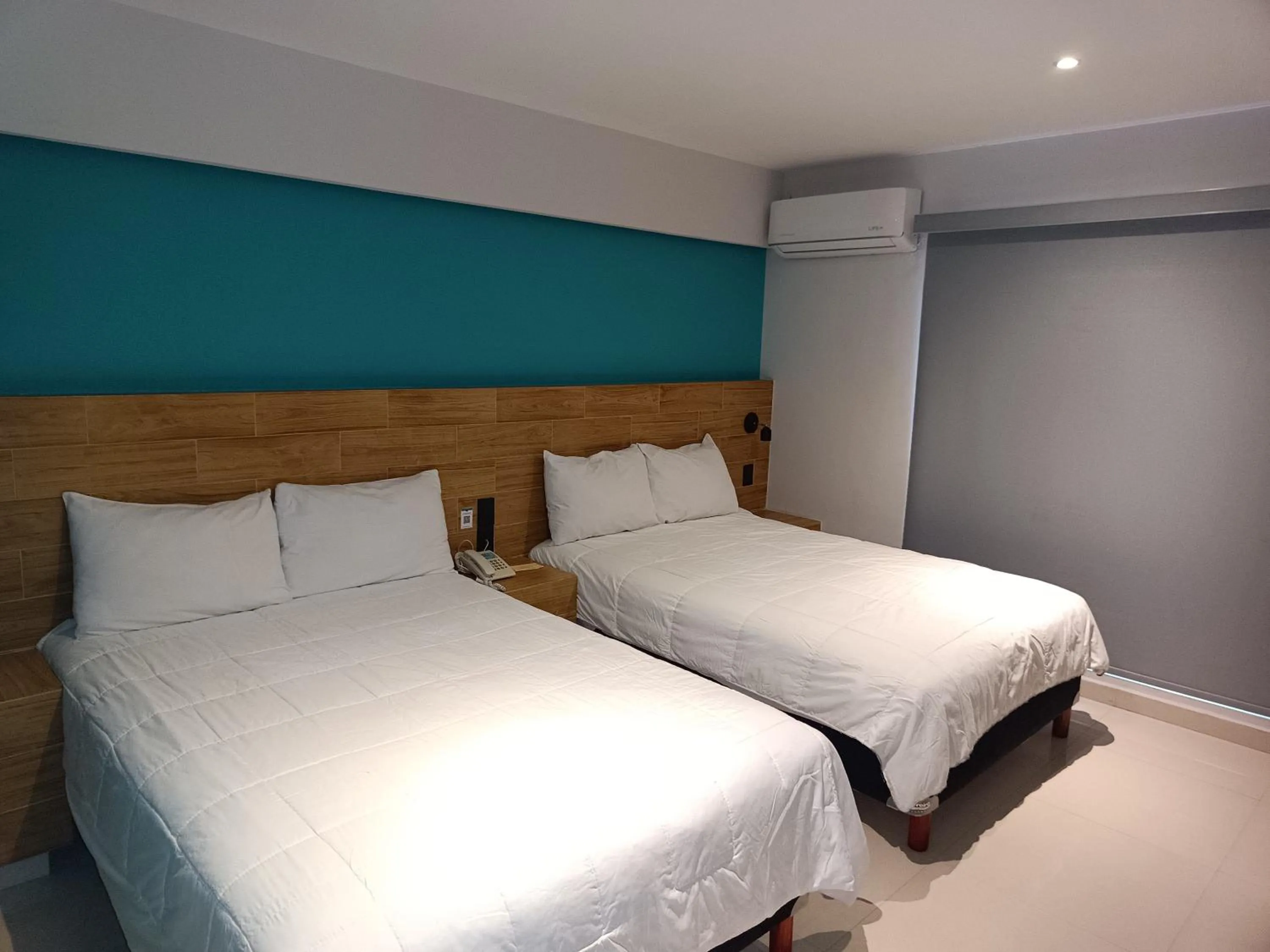 Bed in Hotel Kavia Mazatlán