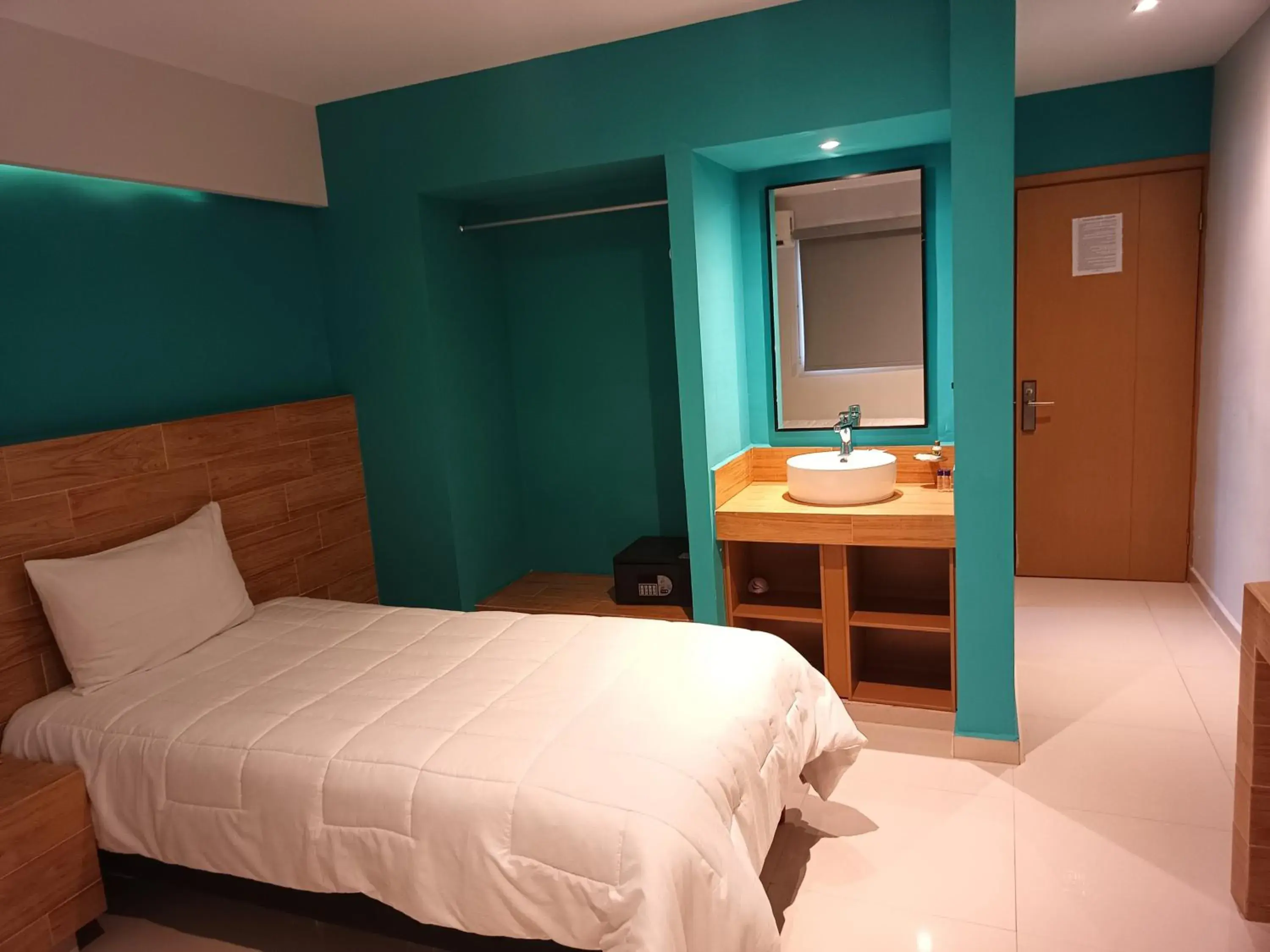 Bed in Hotel Kavia Mazatlán Bed in Hotel Kavia Mazatlán