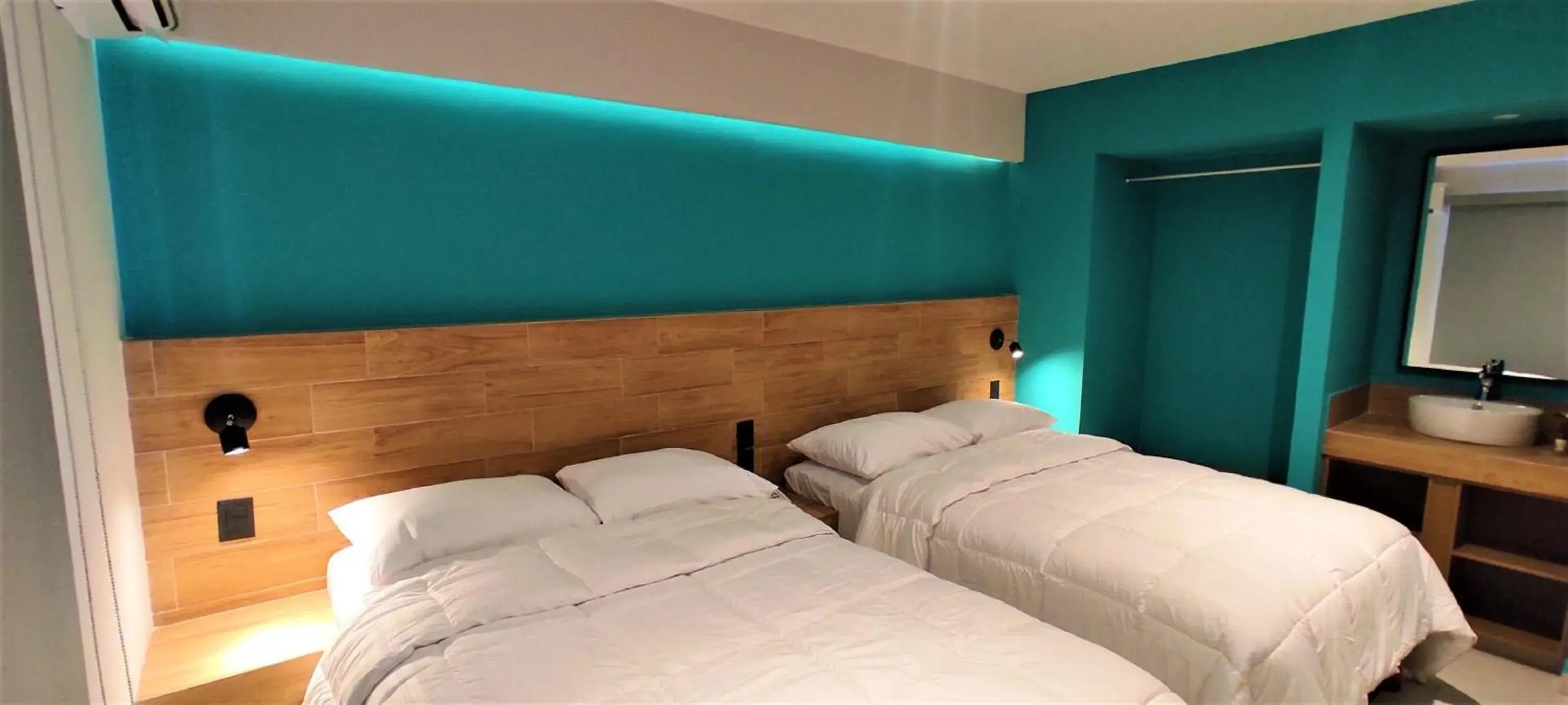 Bed in Hotel Kavia Mazatlán Bed in Hotel Kavia Mazatlán