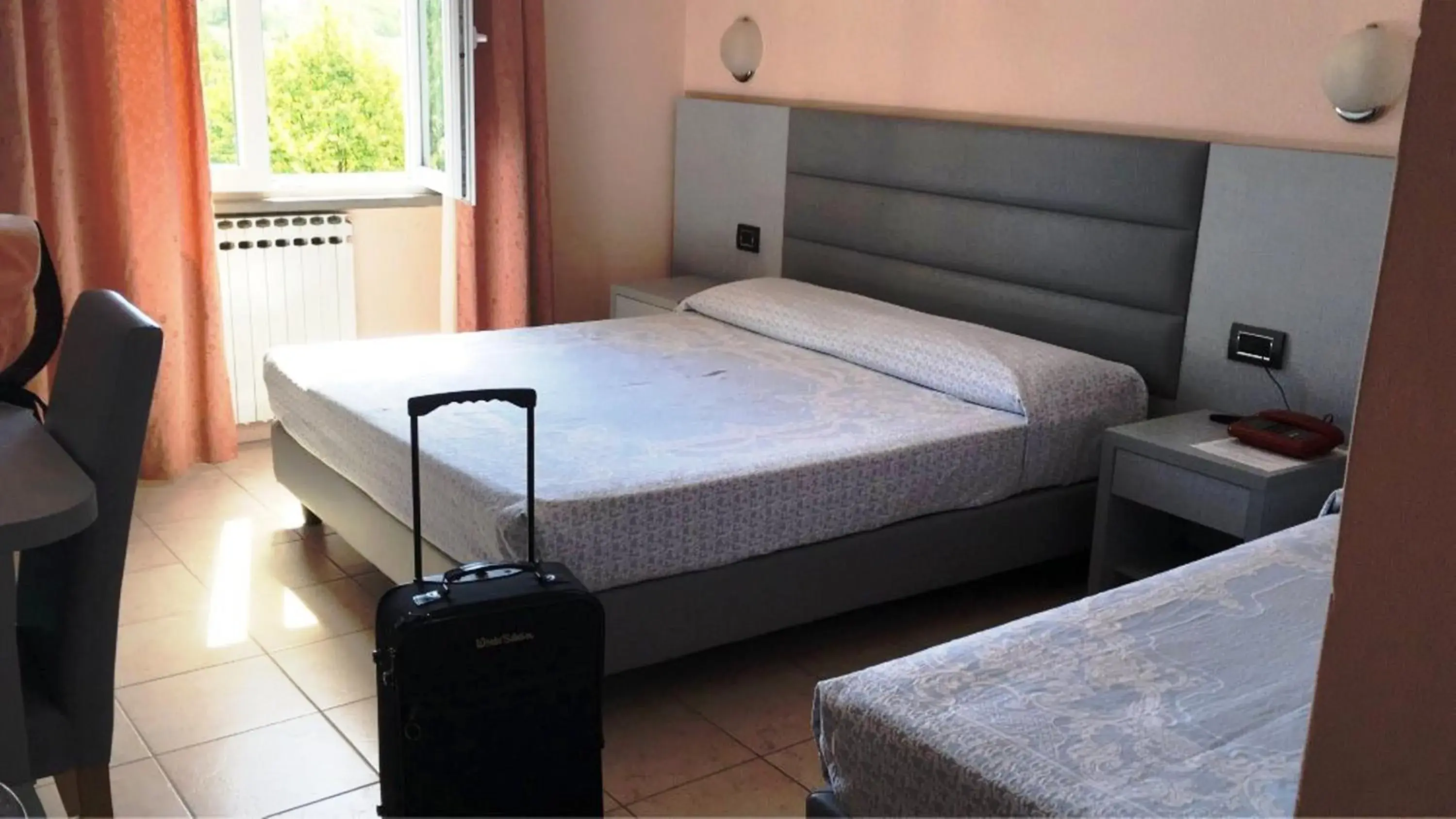 Bedroom, Bed in Hotel La Meridiana Bedroom, Bed in Hotel La Meridiana