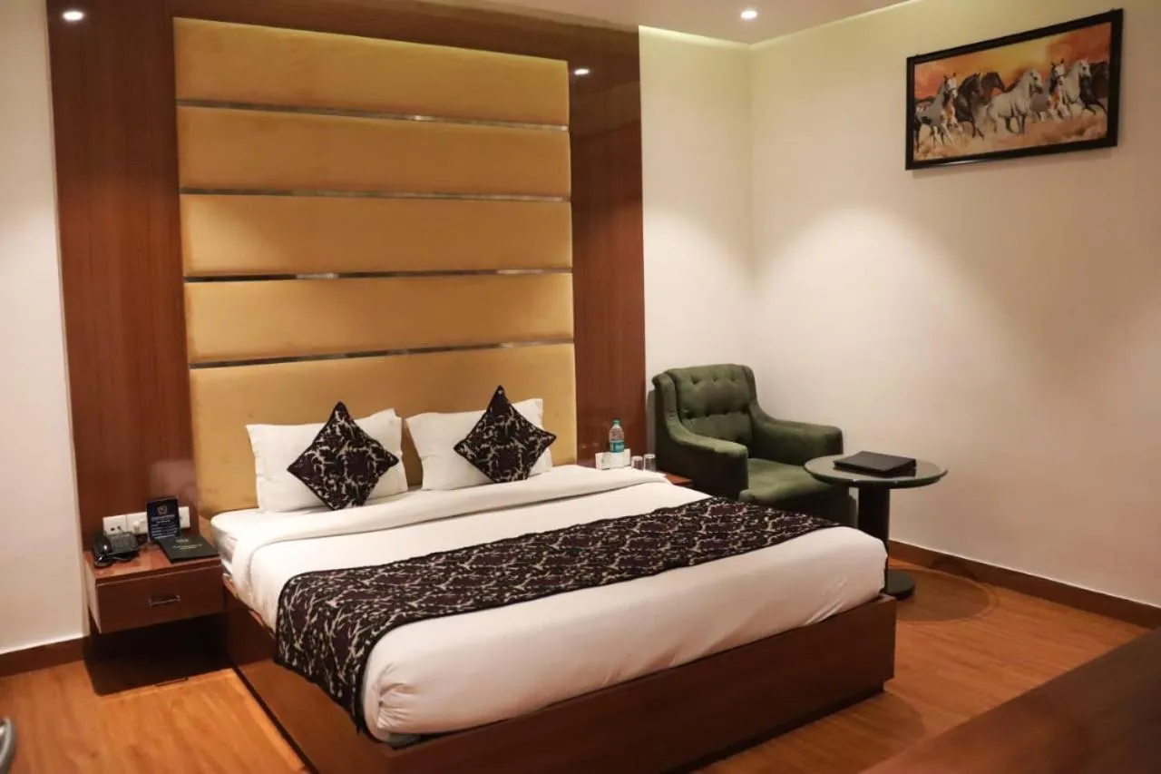 Bed in Grand Geet Hotels
