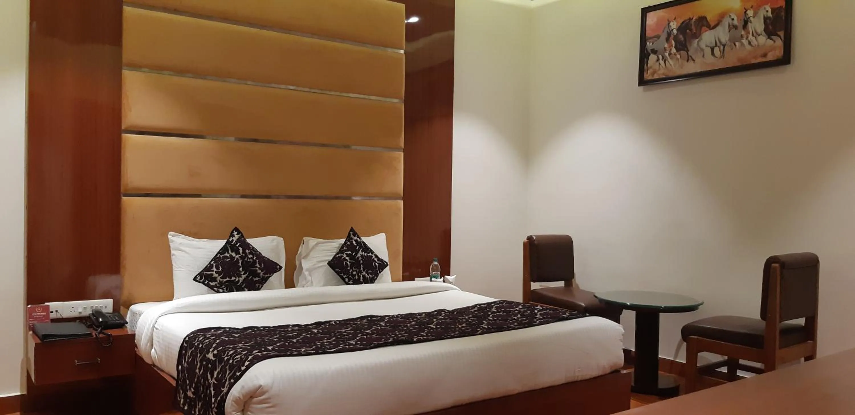 Bed in Grand Geet Hotels