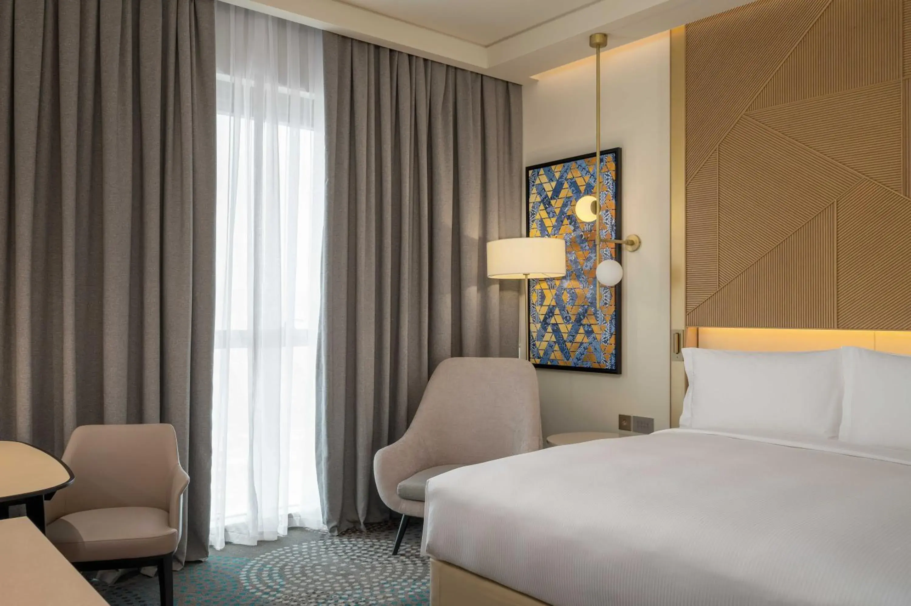 Guest Room King Bed in Slemani Rotana Guest Room King Bed in Slemani Rotana