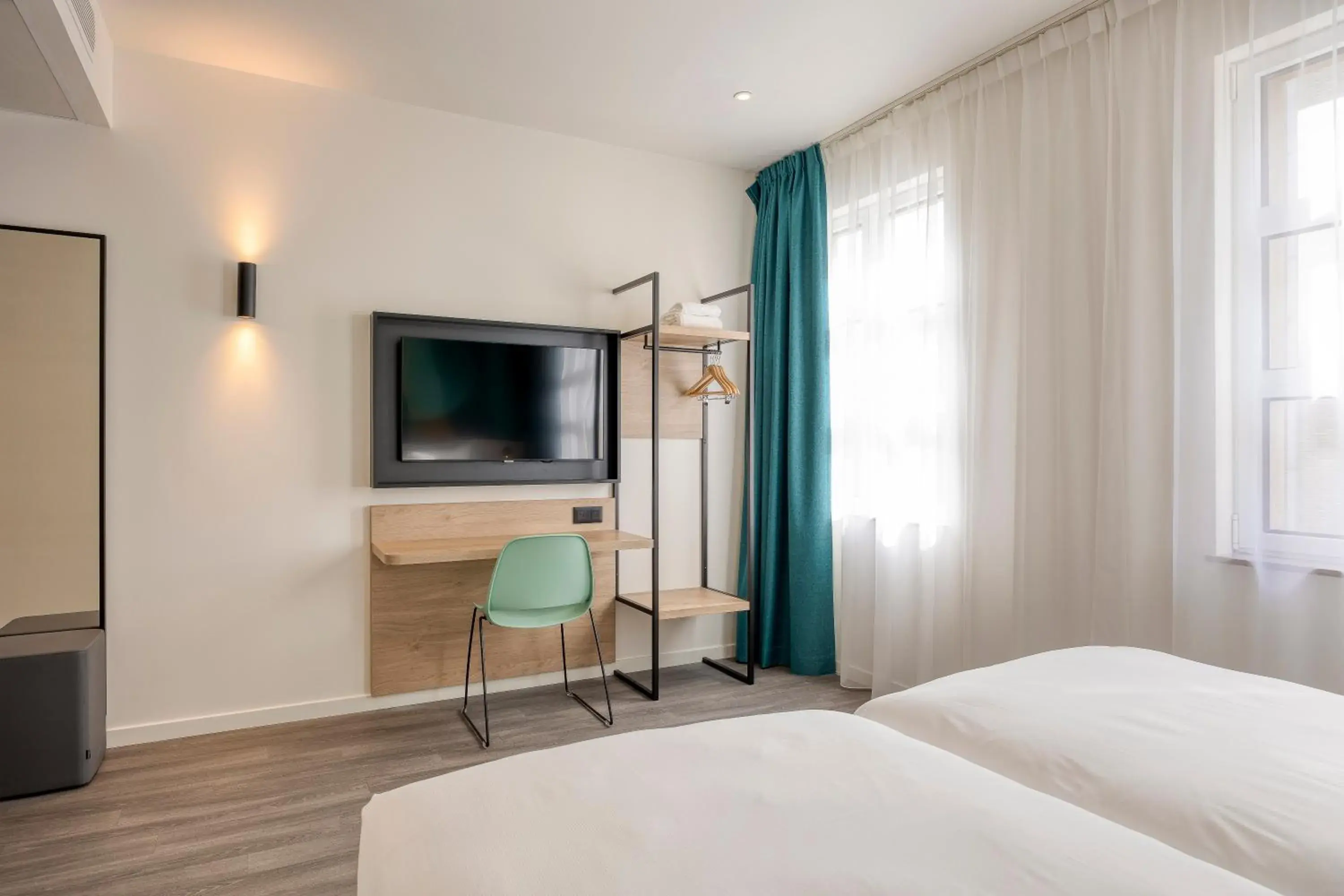 TV and multimedia, Bed in B&B HOTEL Hasselt TV and multimedia, Bed in B&B HOTEL Hasselt