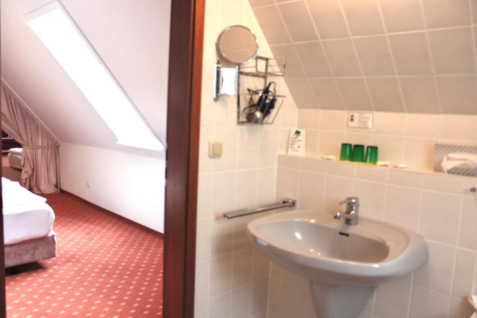 Bathroom, Bed in Hotel Seerose Bad Malente