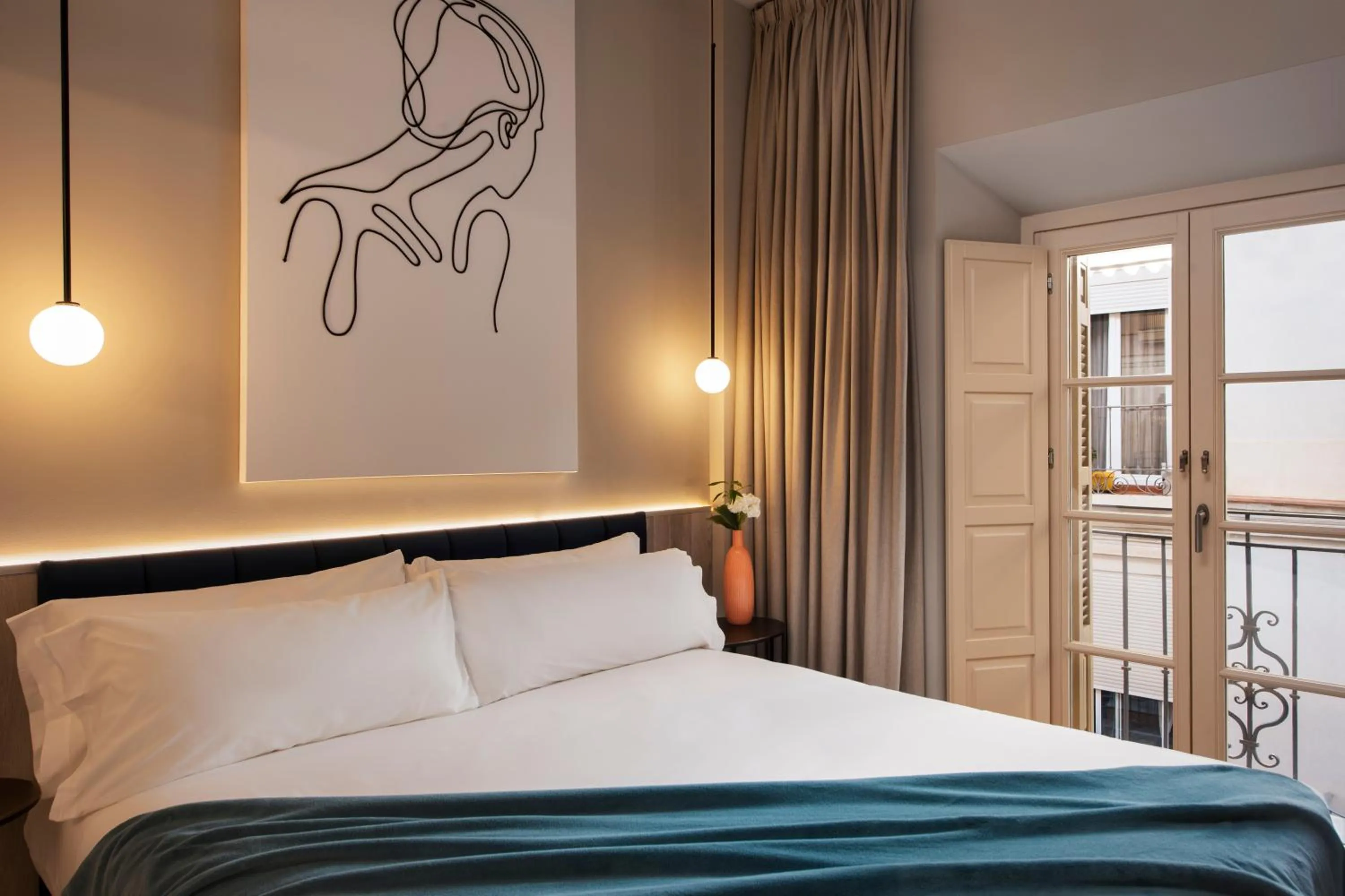 Bed in Coeo Peña Design Apartments