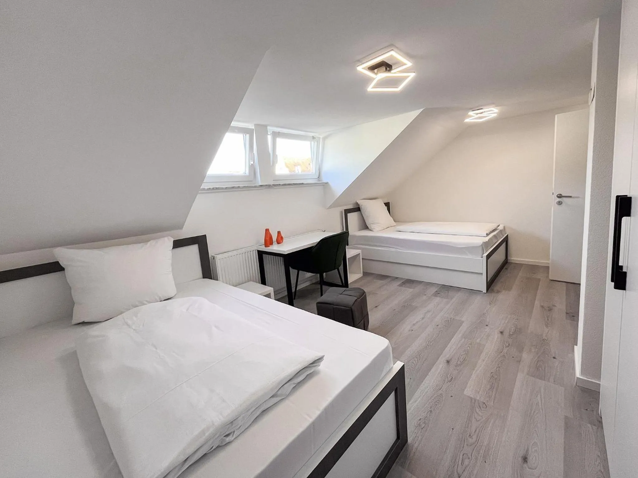 Photo of the whole room, Bed in DORMERO Hotel Reutlingen