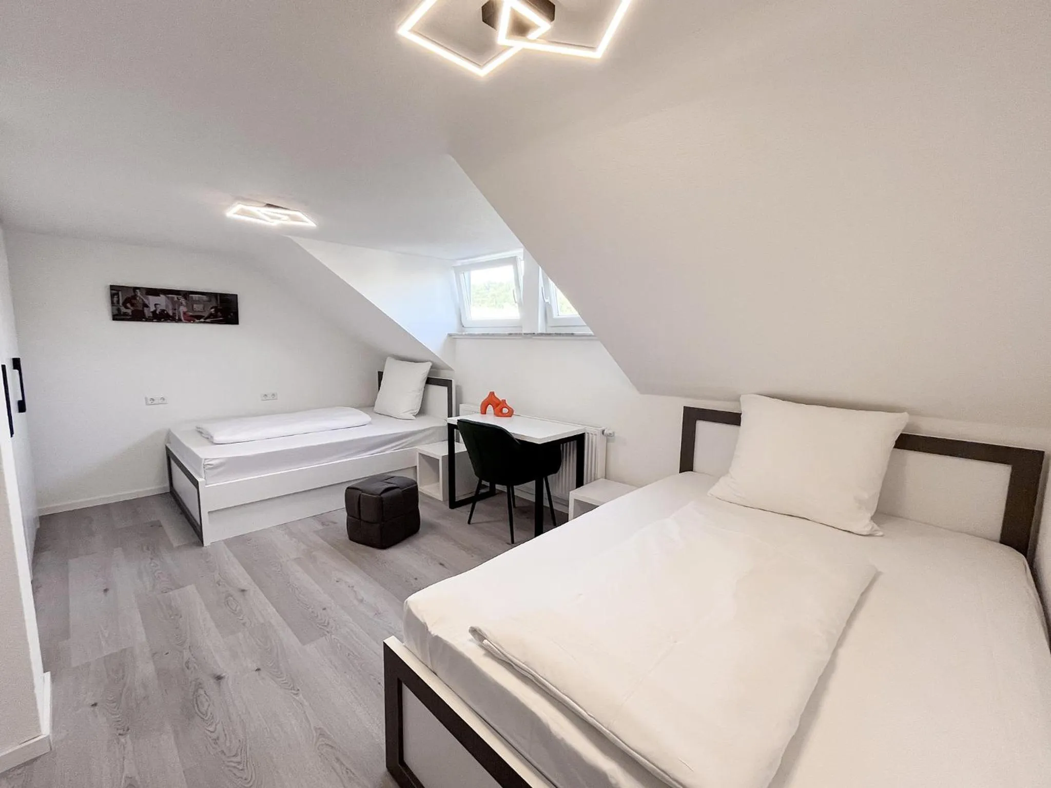 Photo of the whole room, Bed in DORMERO Hotel Reutlingen