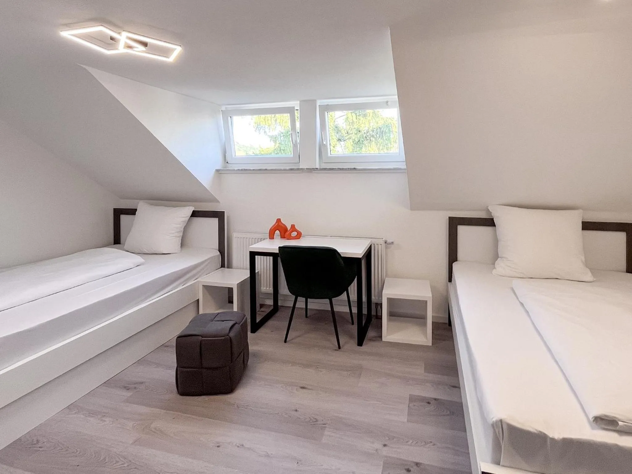 Photo of the whole room, Bed in DORMERO Hotel Reutlingen