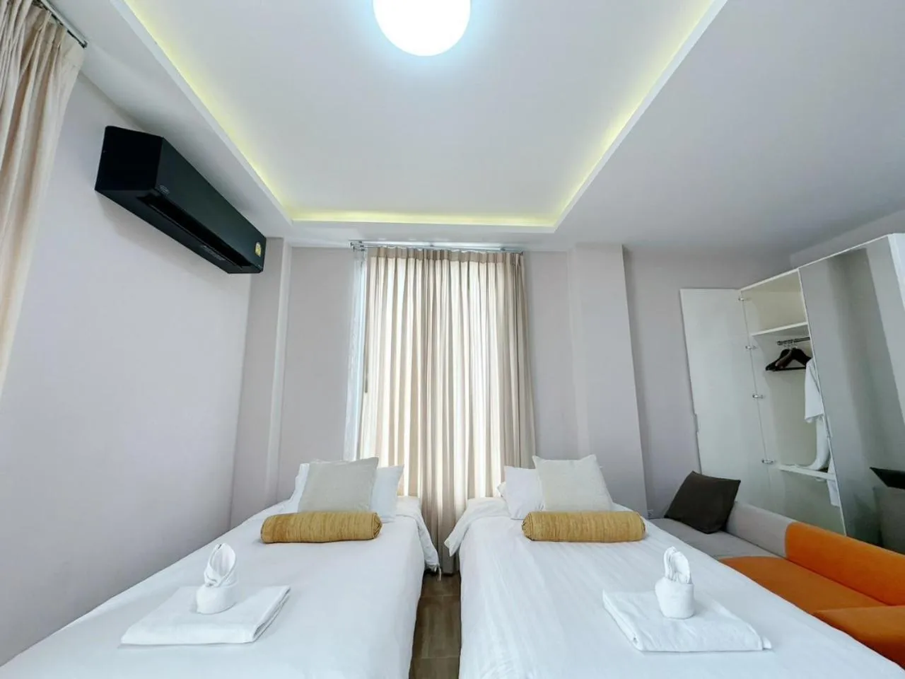 Bed in Daddy Dream Hotel and Residence