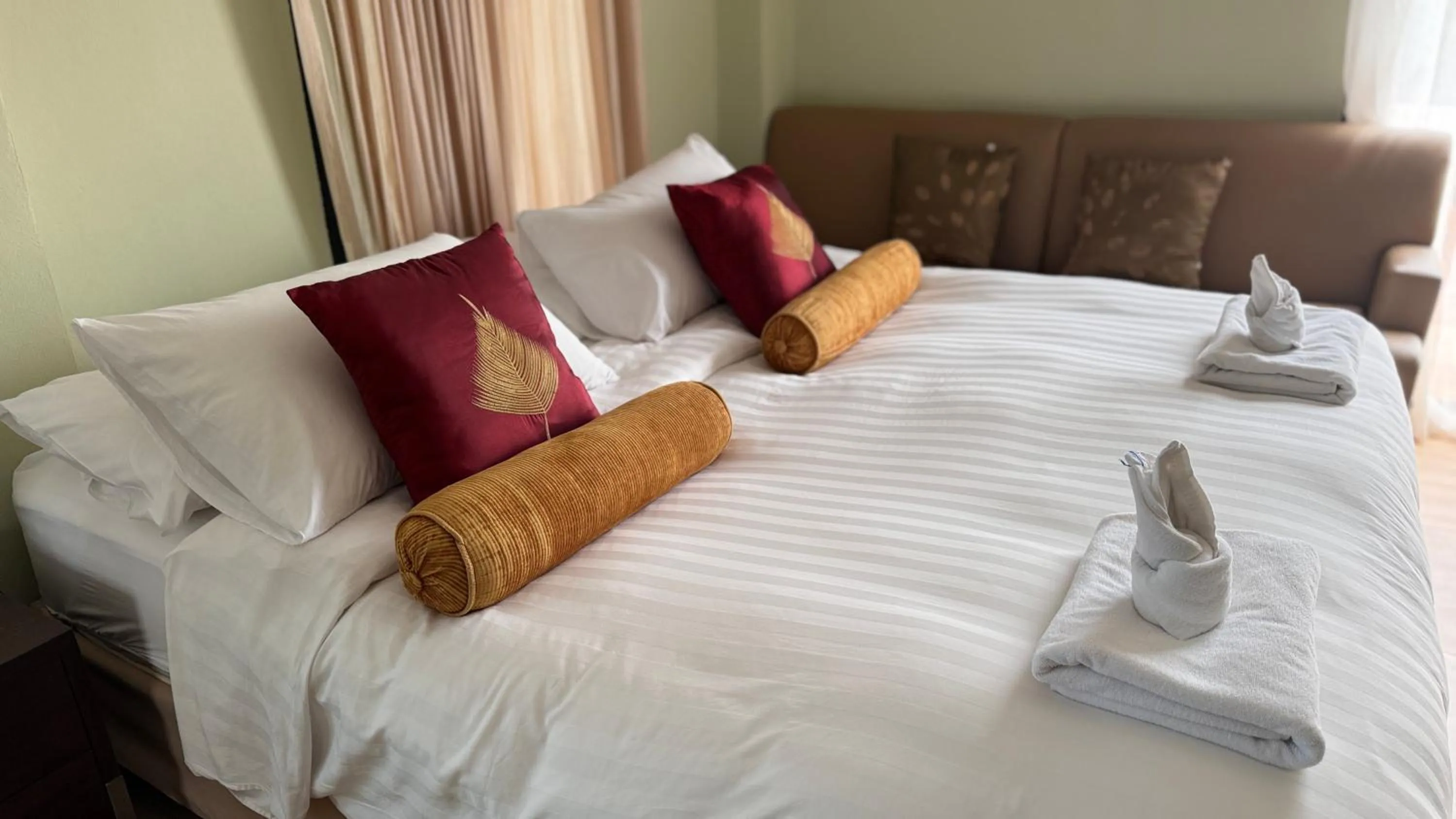 Bed in Daddy Dream Hotel and Residence