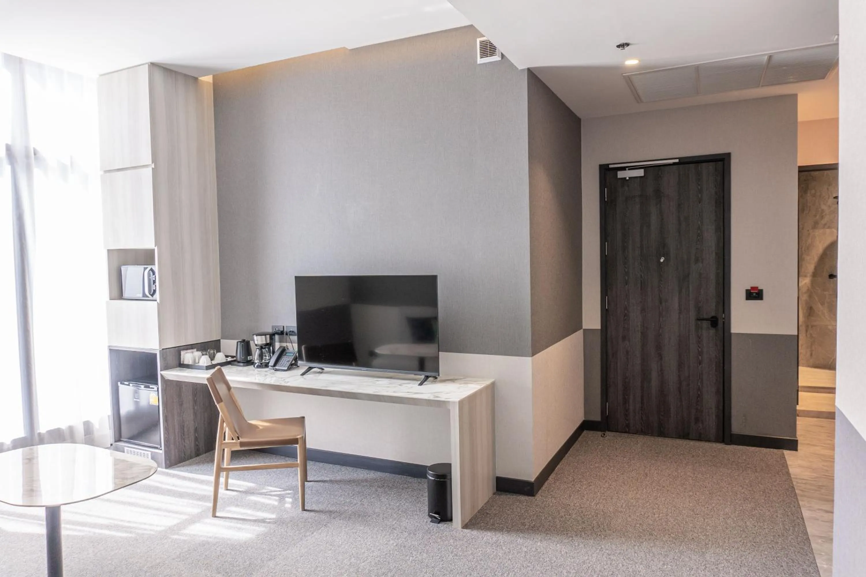 Living room in Ramada Plaza by Wyndham Bangkok Sukhumvit 48