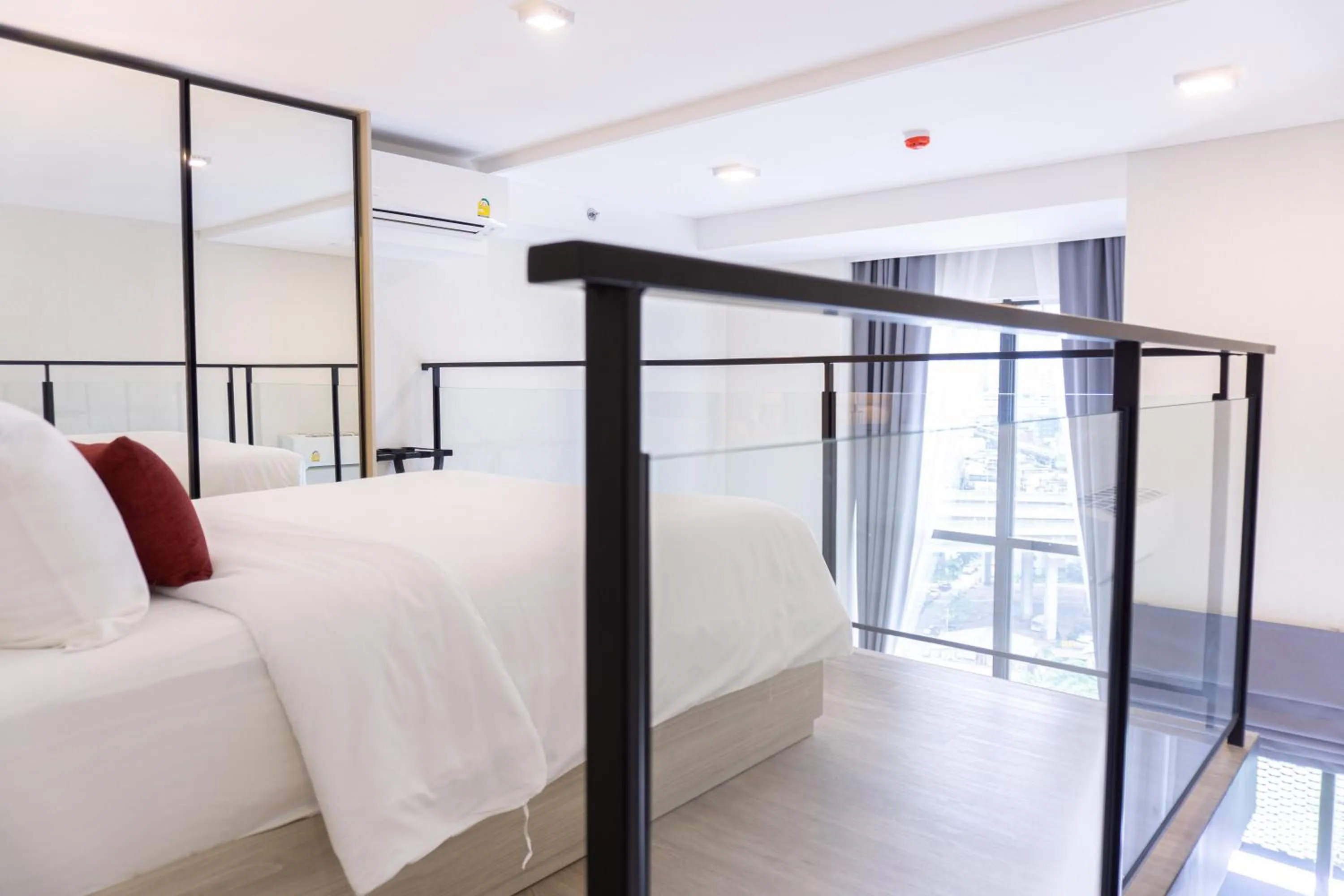 Bed in Ramada Plaza by Wyndham Bangkok Sukhumvit 48