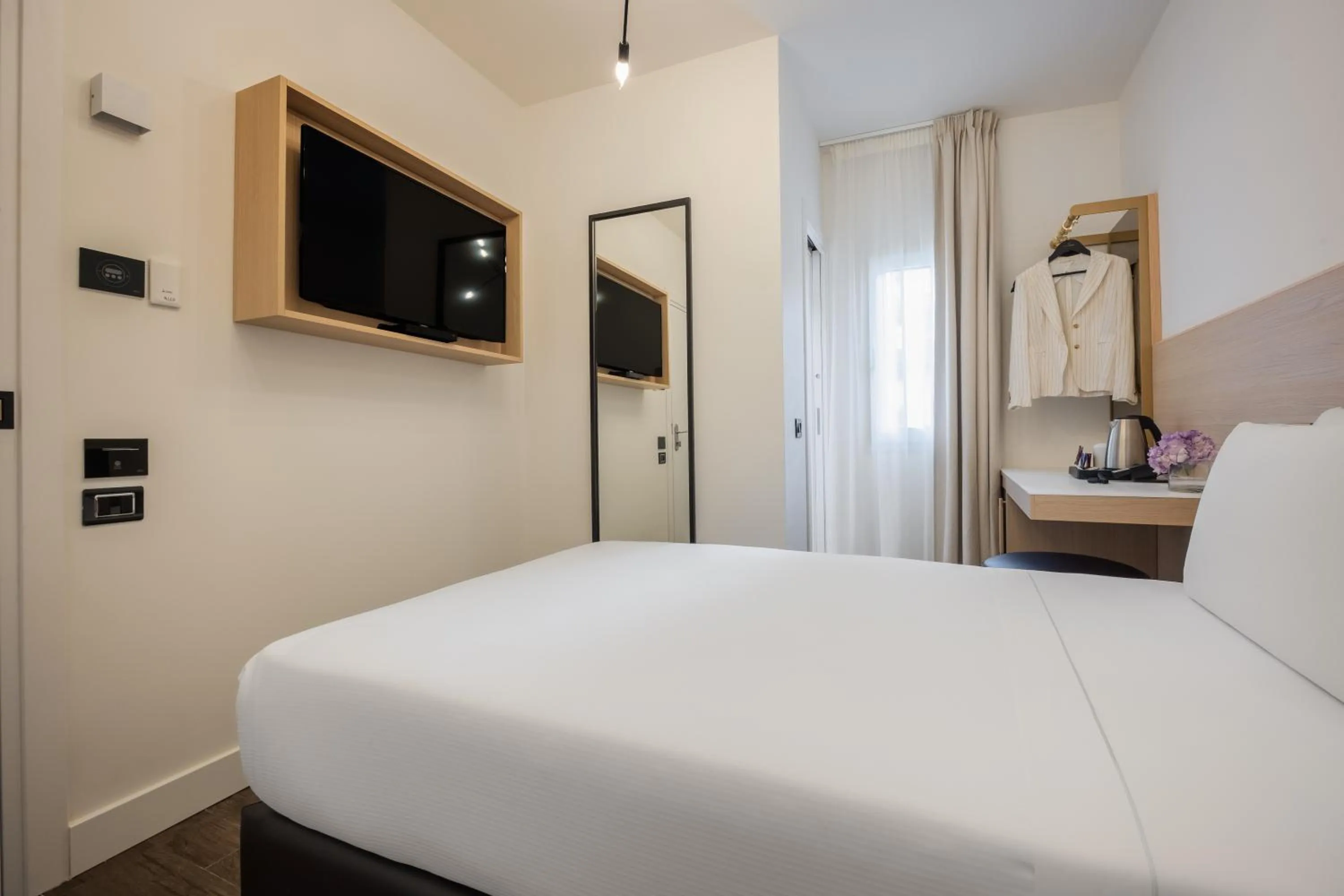 Bed in Globus Urban Hotel