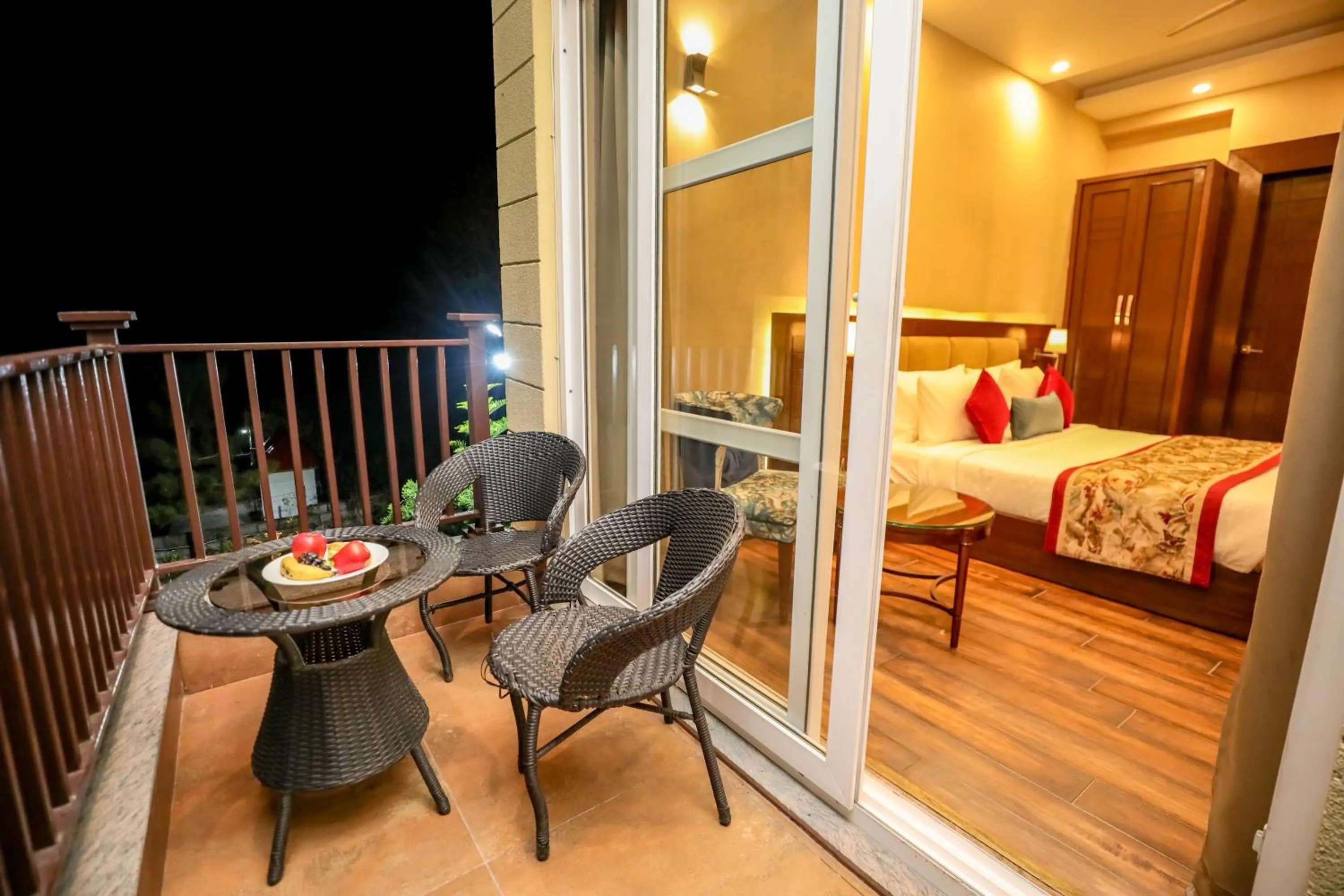 Balcony/Terrace, Bed in Regenta Resort Exotica Dharamshala on Hilltop