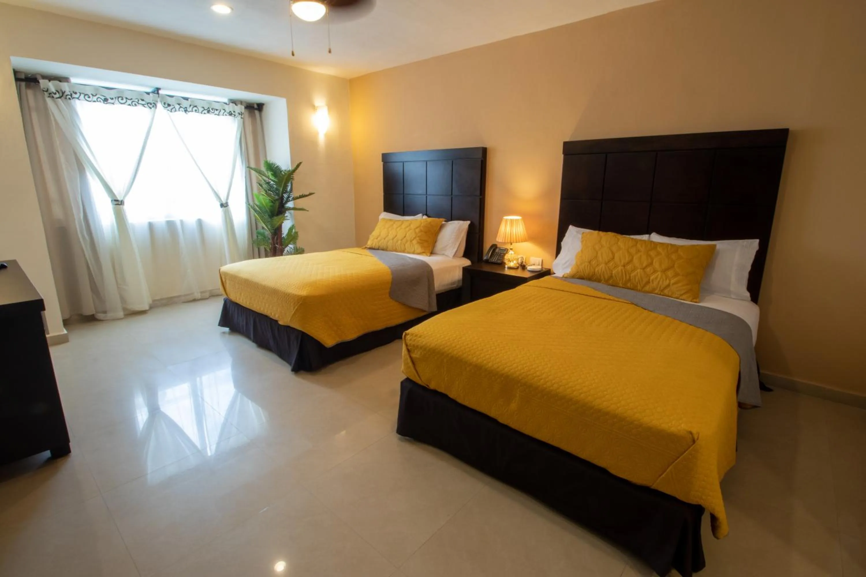 Bed in Hotel Villas Segovia Playa del Carmen