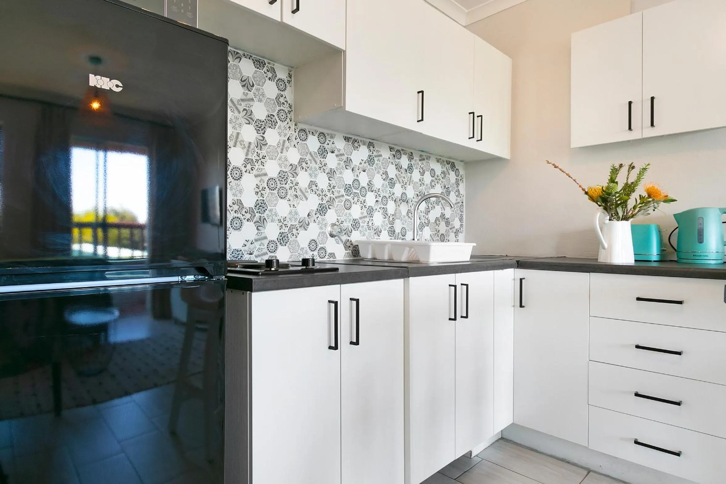 Kitchen or kitchenette in Serengeti selfcatering apartments Perfect Stay