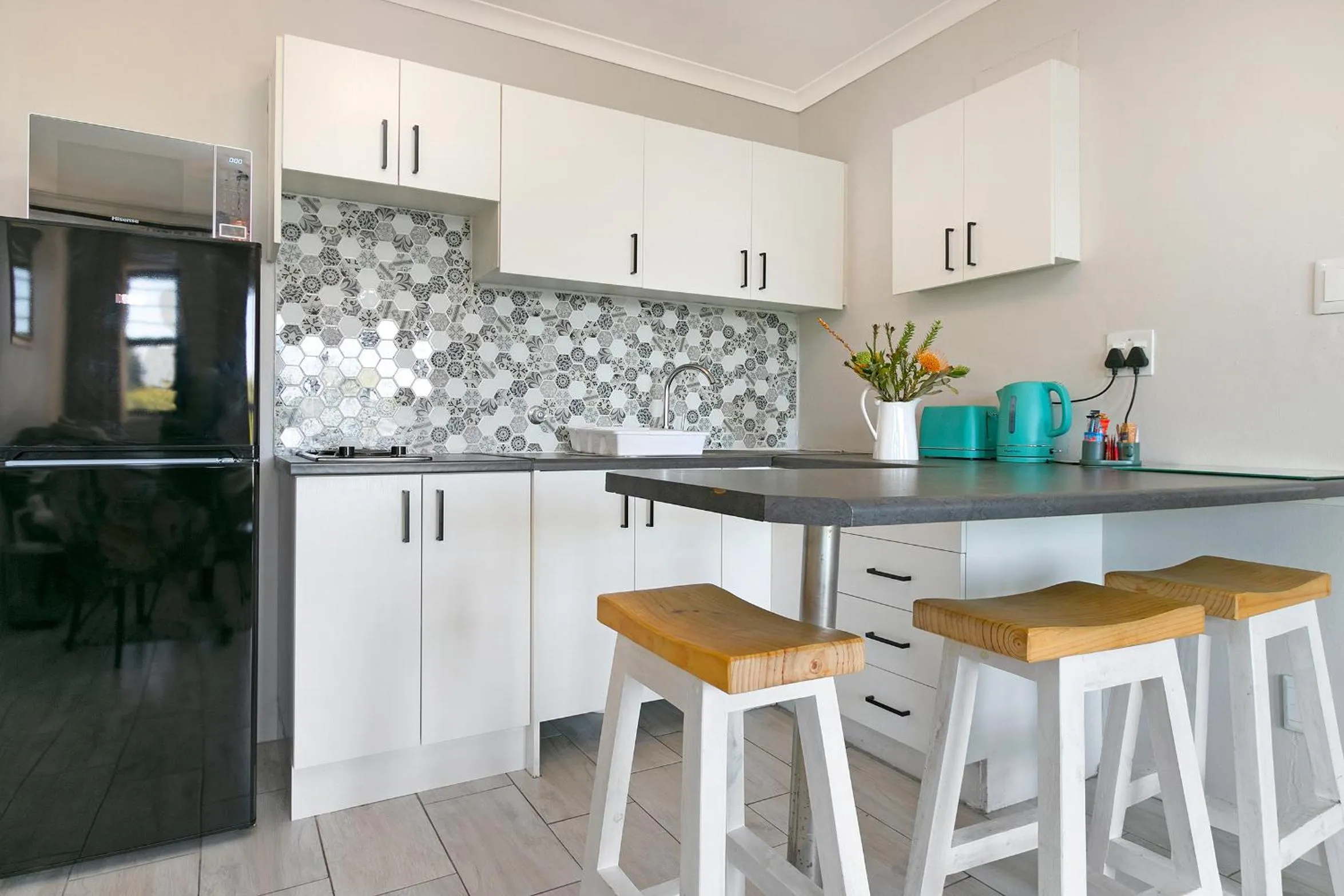 Kitchen or kitchenette in Serengeti selfcatering apartments Perfect Stay
