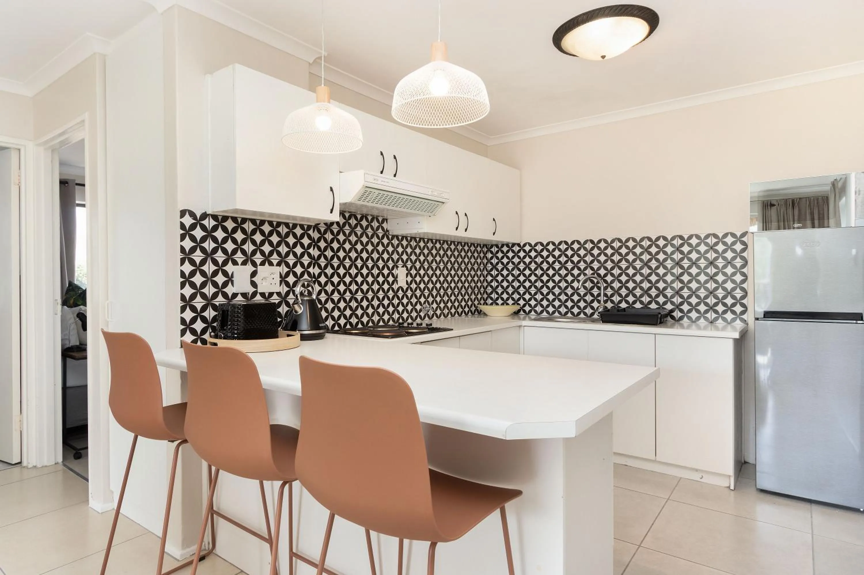 Kitchen or kitchenette in Serengeti selfcatering apartments Perfect Stay