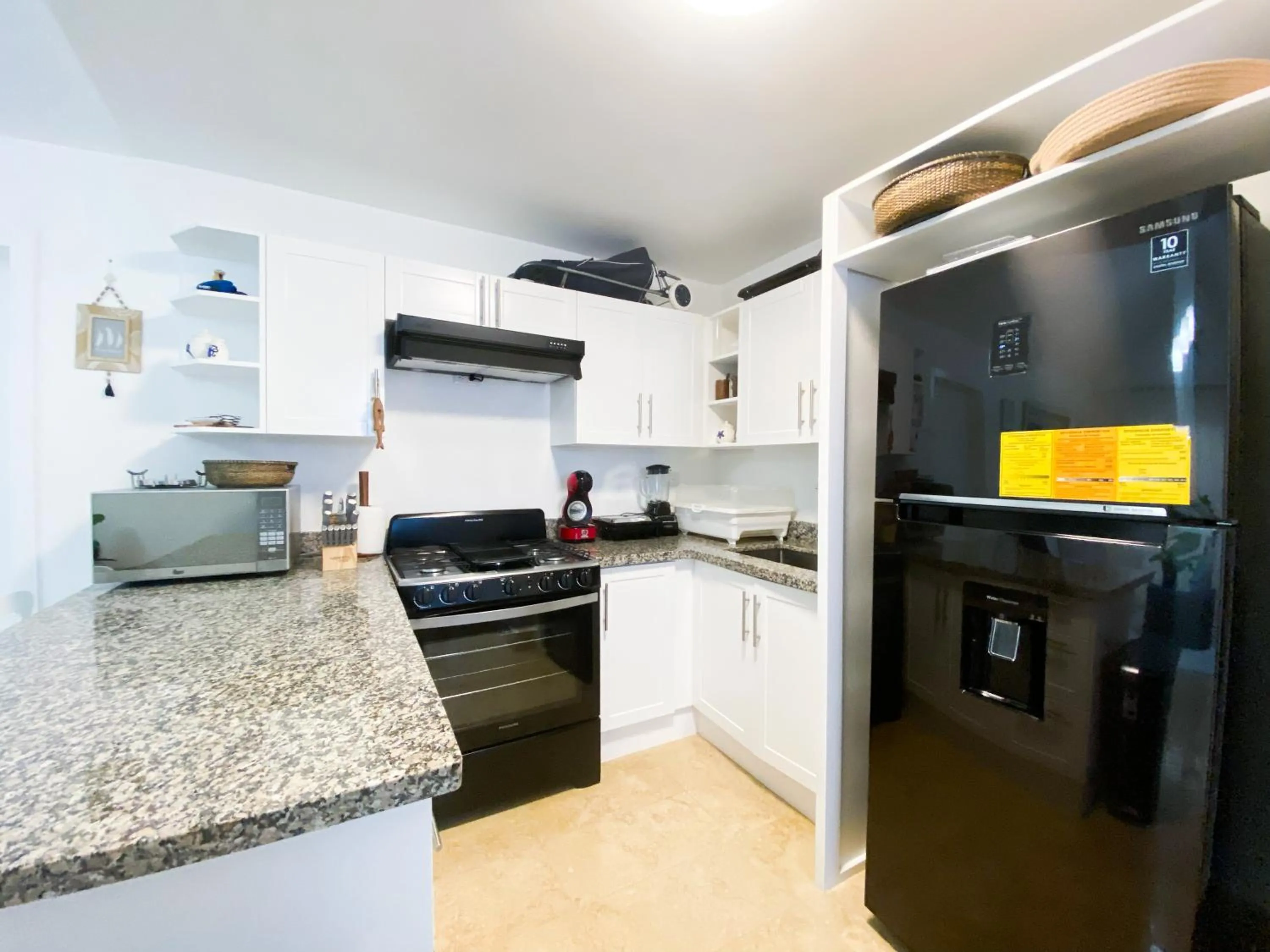 Kitchen or kitchenette in Xeliter Green One Playa Dorada