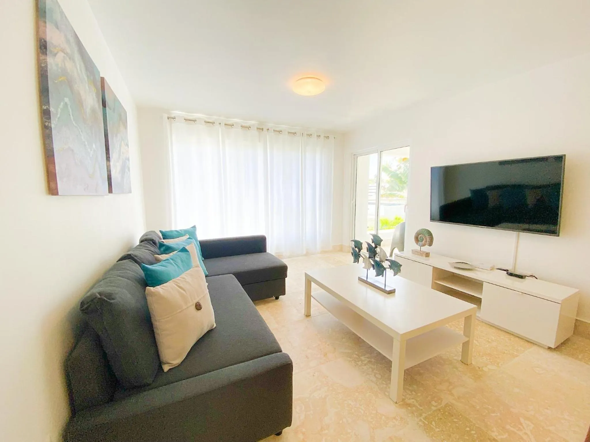 Living room in Xeliter Green One Playa Dorada